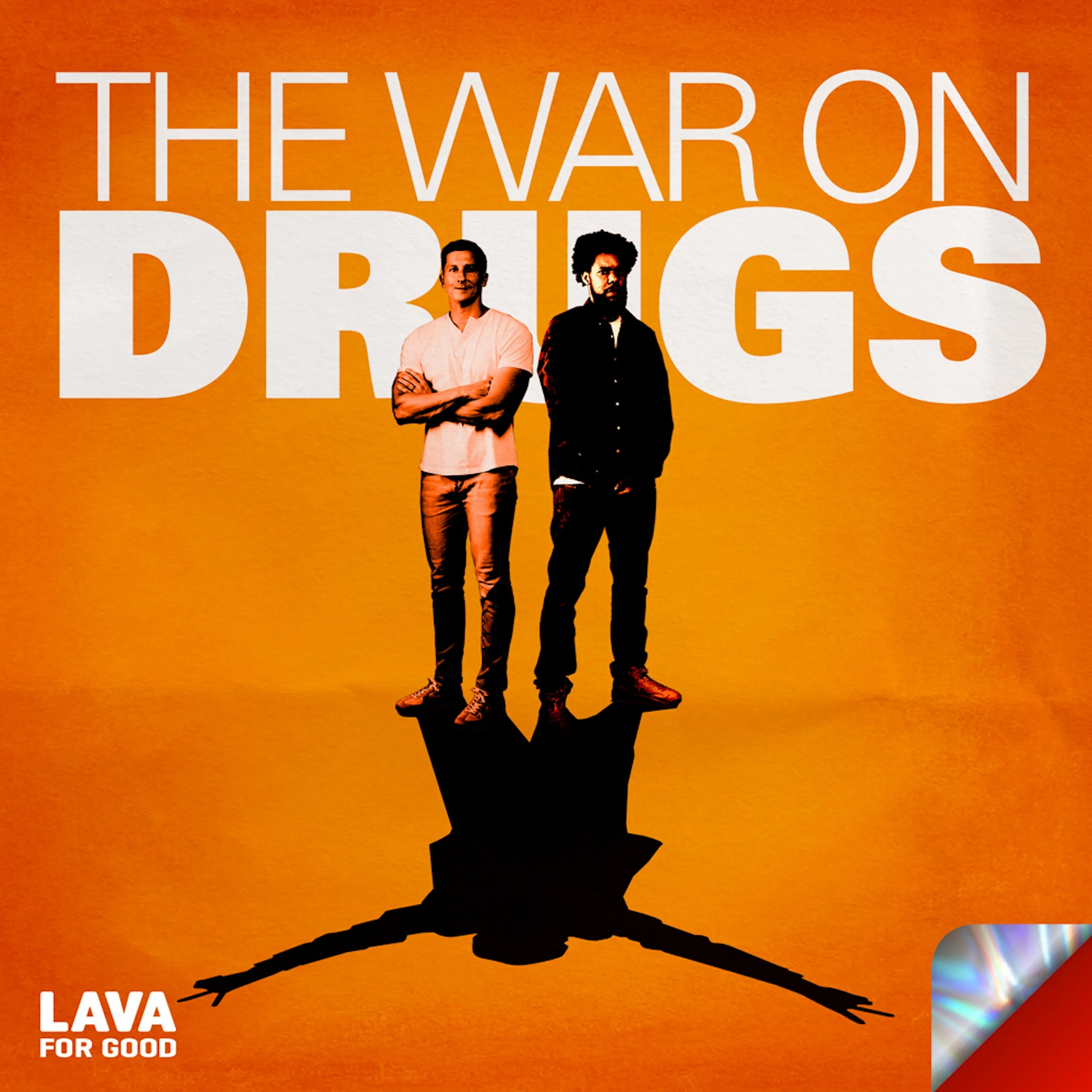 "The War on Drugs" white text on orange background with an image of two men casting a shadow that appears to be one person with their arms outstretched into a V.