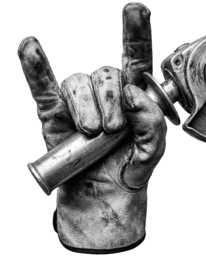 Close-up of a dirty, grimy hand holding a metal spray gun, with the index finger pointing up.