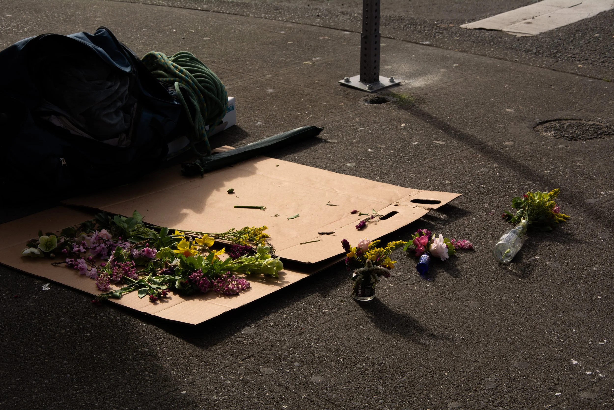 An array of discarded flowers at the corner of E Pike Street and 10th Avenue in Seattle, Wash.