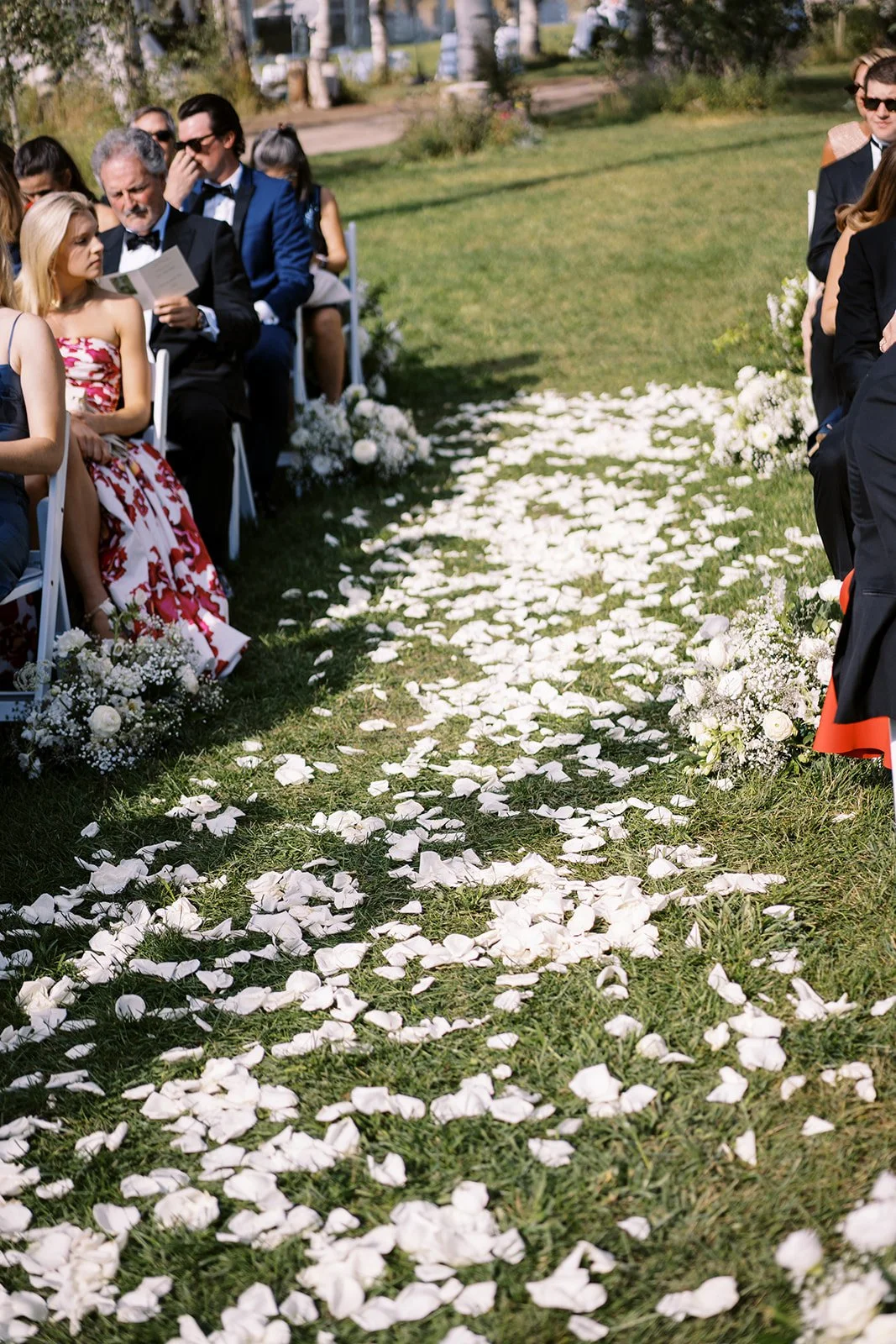 heavy aisle petals on grass