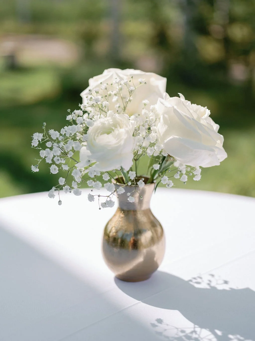 gold bud vase cocktail table centerpiece