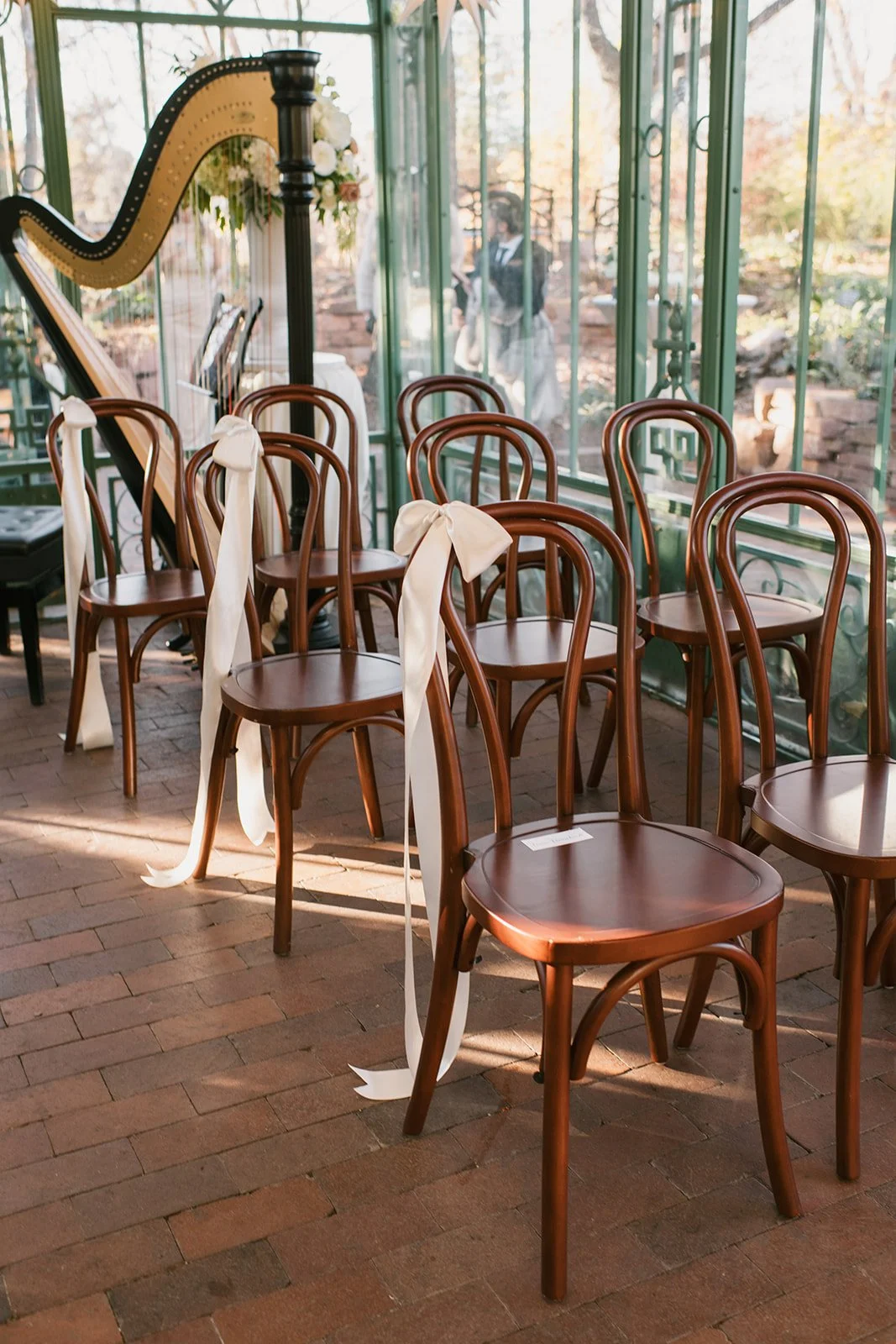 Woodland Mosaic Wedding Ceremony
Cafe chair wedding ceremony
Bow aisle decor
Photo Credit: Shelly Anderson