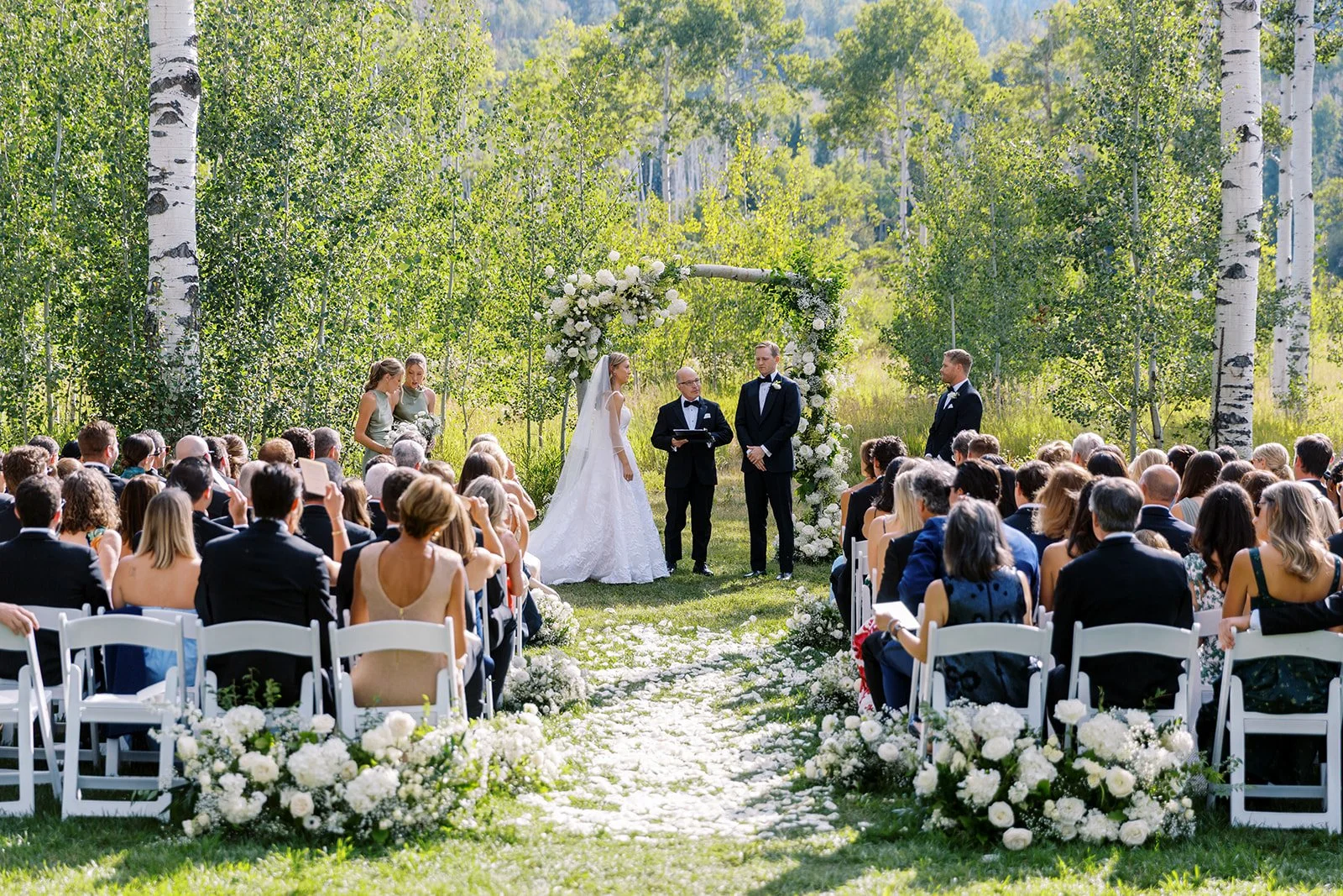 aspen grove wedding, white wedding arch, birch wood arch, steamboat springs florist