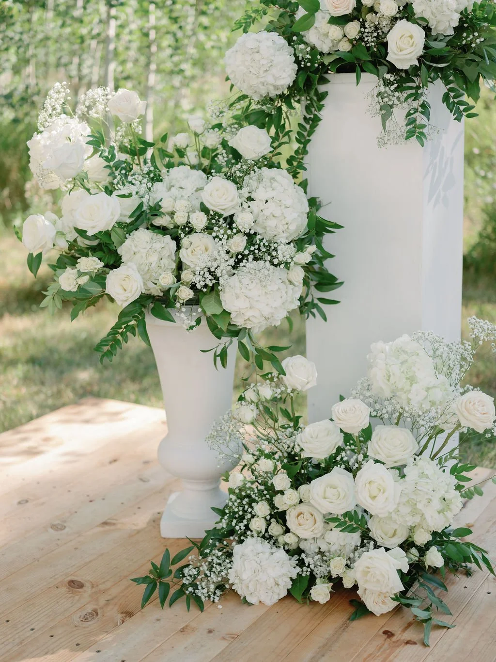 ceremony flowers in white urn