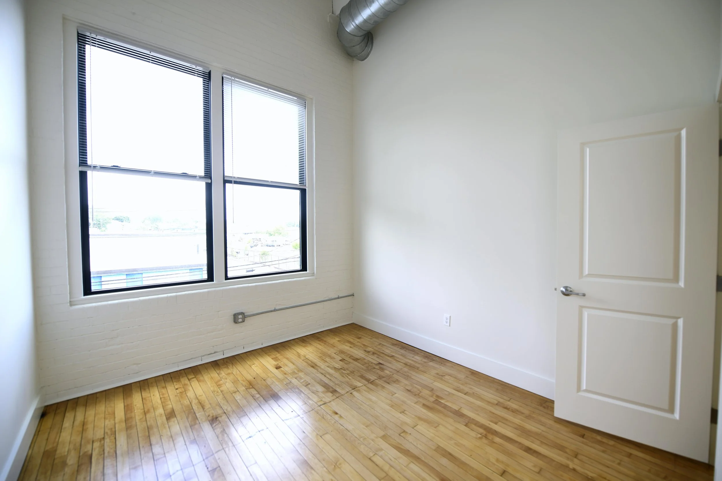 APT 2 � bedroom with blinds looking in-min.JPG