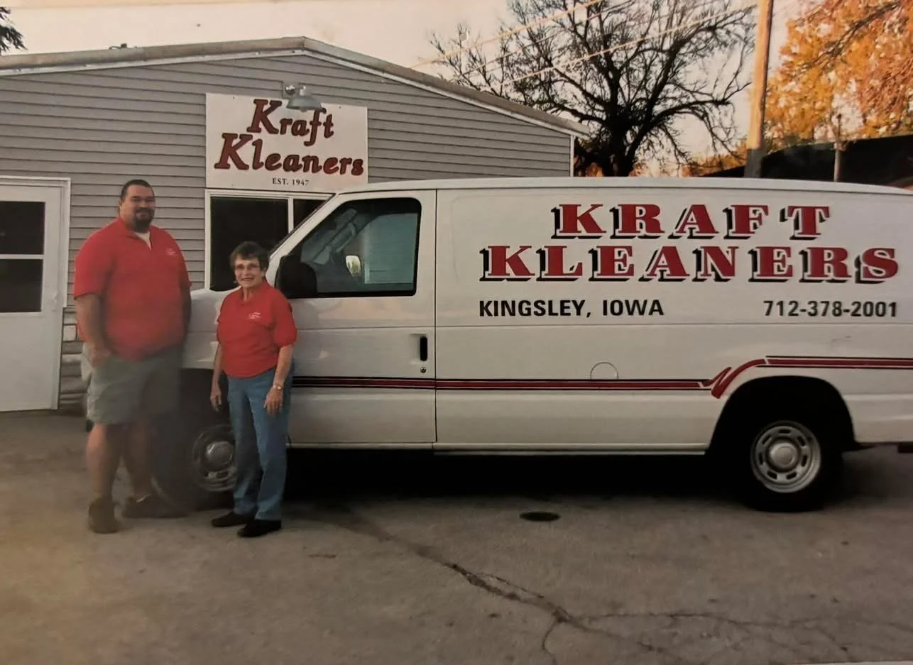Margaret and coworker posing in front of The Kraft Cleaners