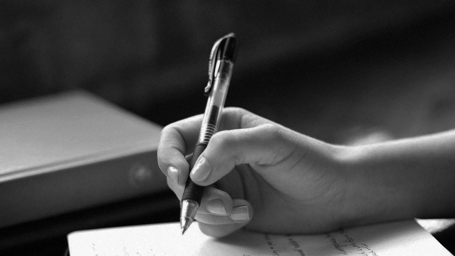 Pen writing on paper