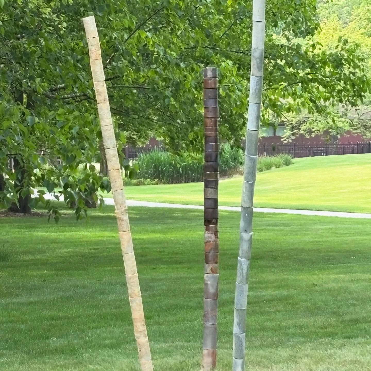 REALITY

Installation at Dow Gardens, Reality represents my interpretation of the 8th chakra, our aura. OUR aura, the unity of consciousness. Set amidst the birch grove, this sculpture visually approximates our interconnectedness. We are rooted toget
