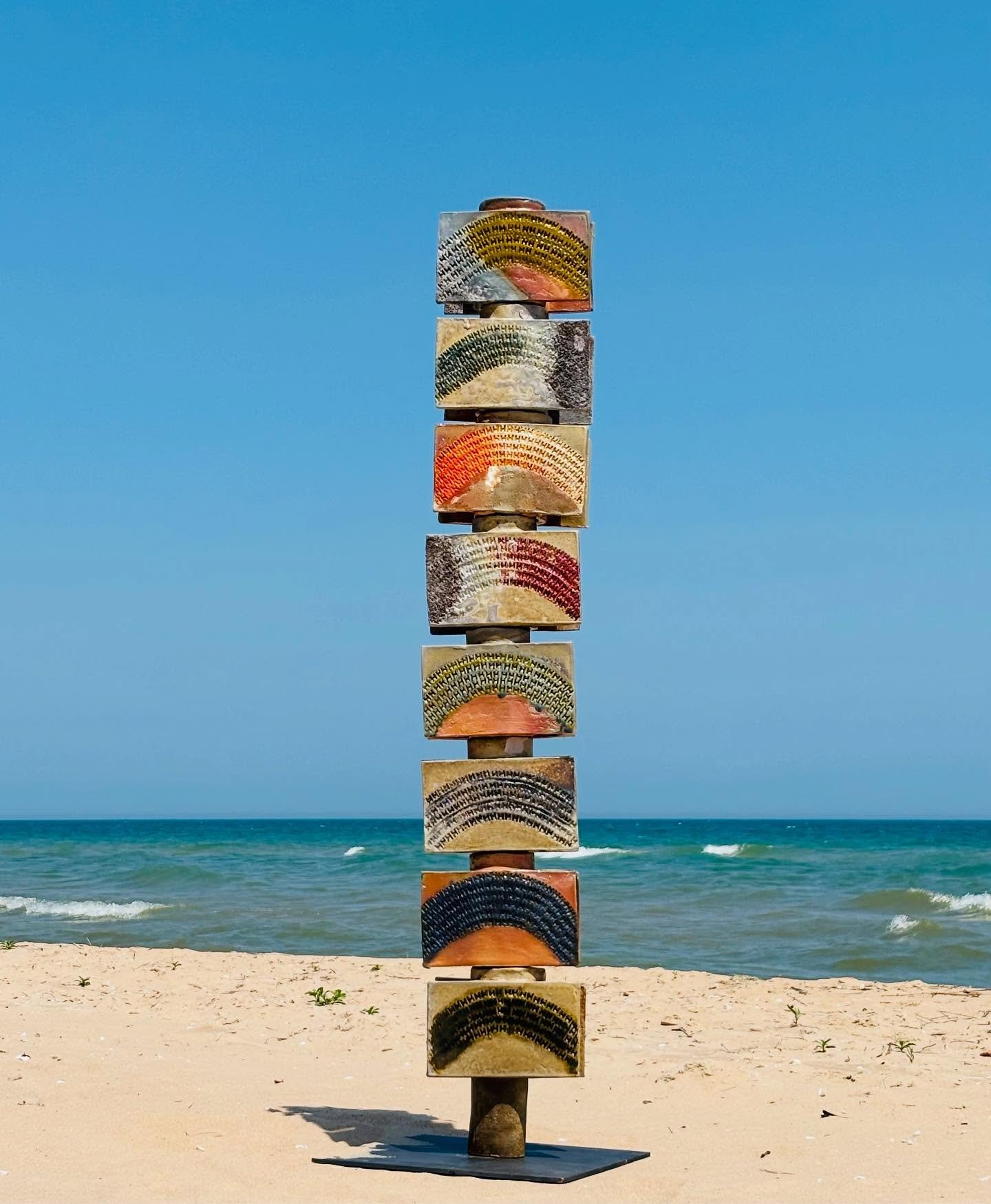 LAGOM. Hand built totem wood fired @scottrossstudio in Michigan. It is one of a trio called Life Force. My intention was to explore the unity and harmony of a rainbow experience using the magic of ash glazing and Scott&rsquo;s firing style with a tou