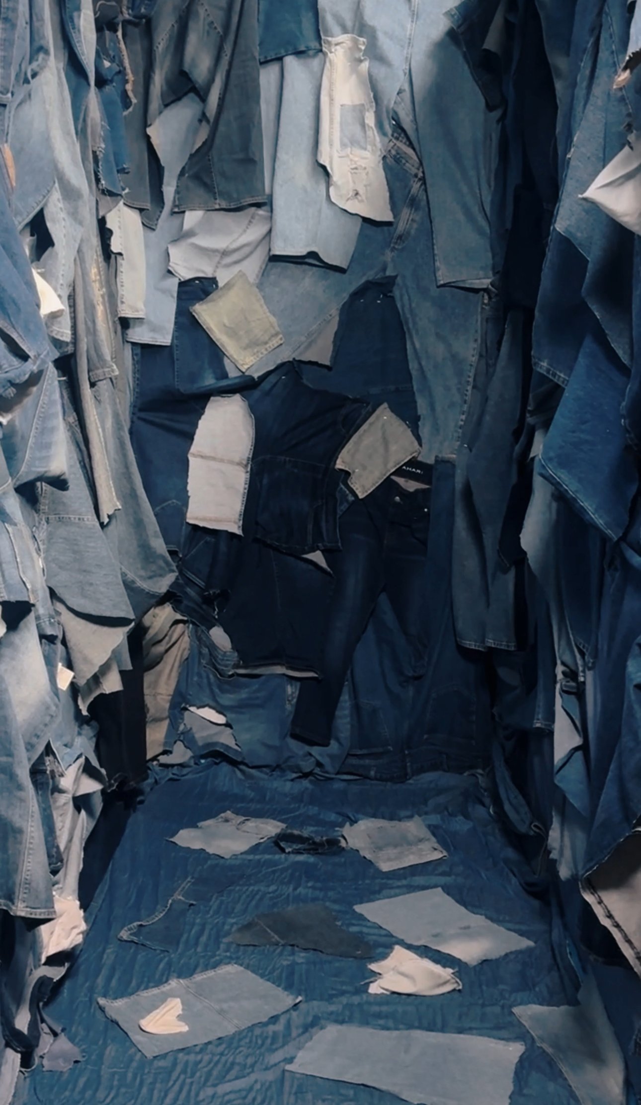 A hallway set made of different cuts and washes of denim at so–ripe studios.