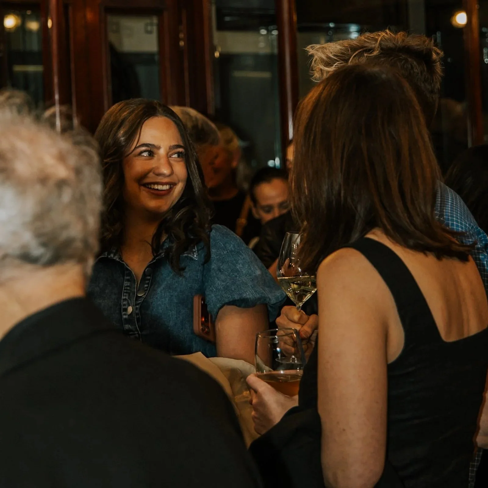 Guests enjoying a private cocktail function in Pendolino's elegant Sydney CBD event space.