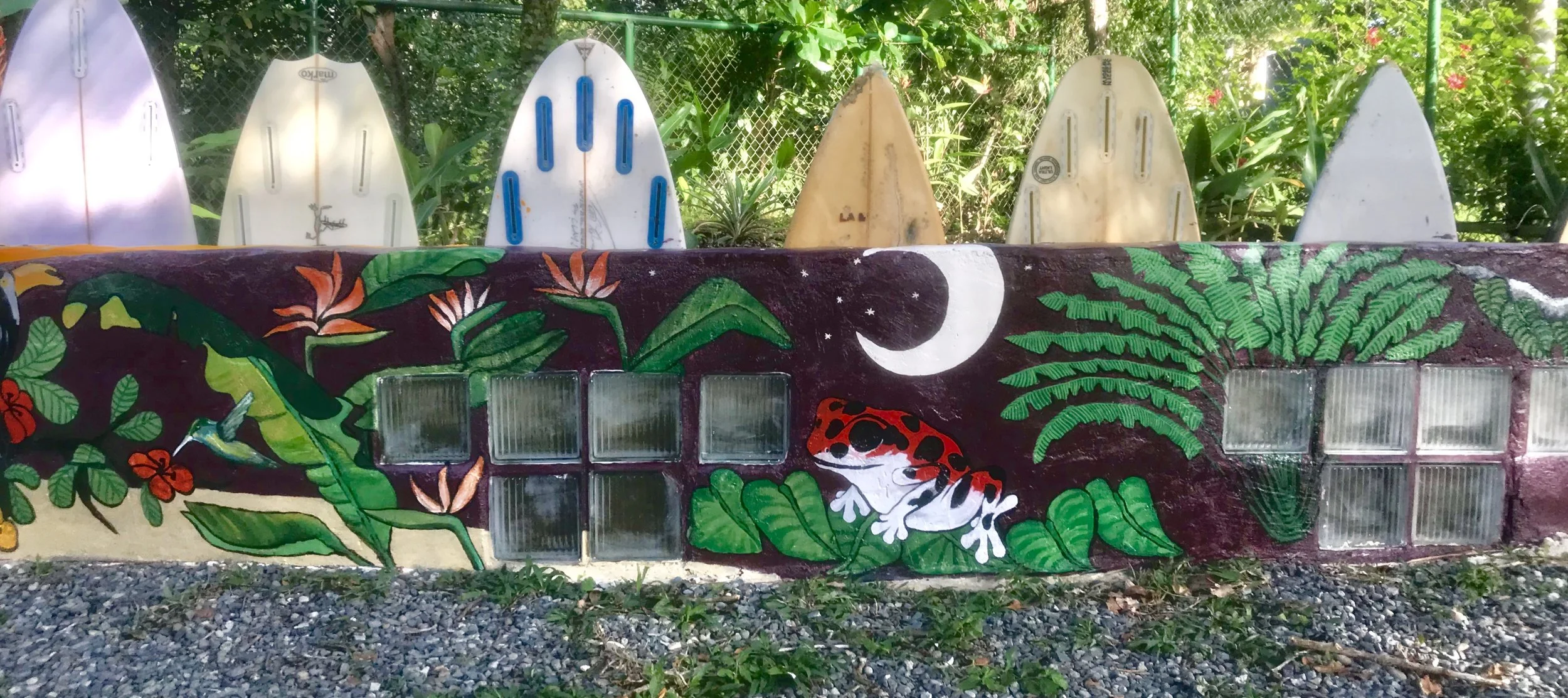 jungle mural with surfboards