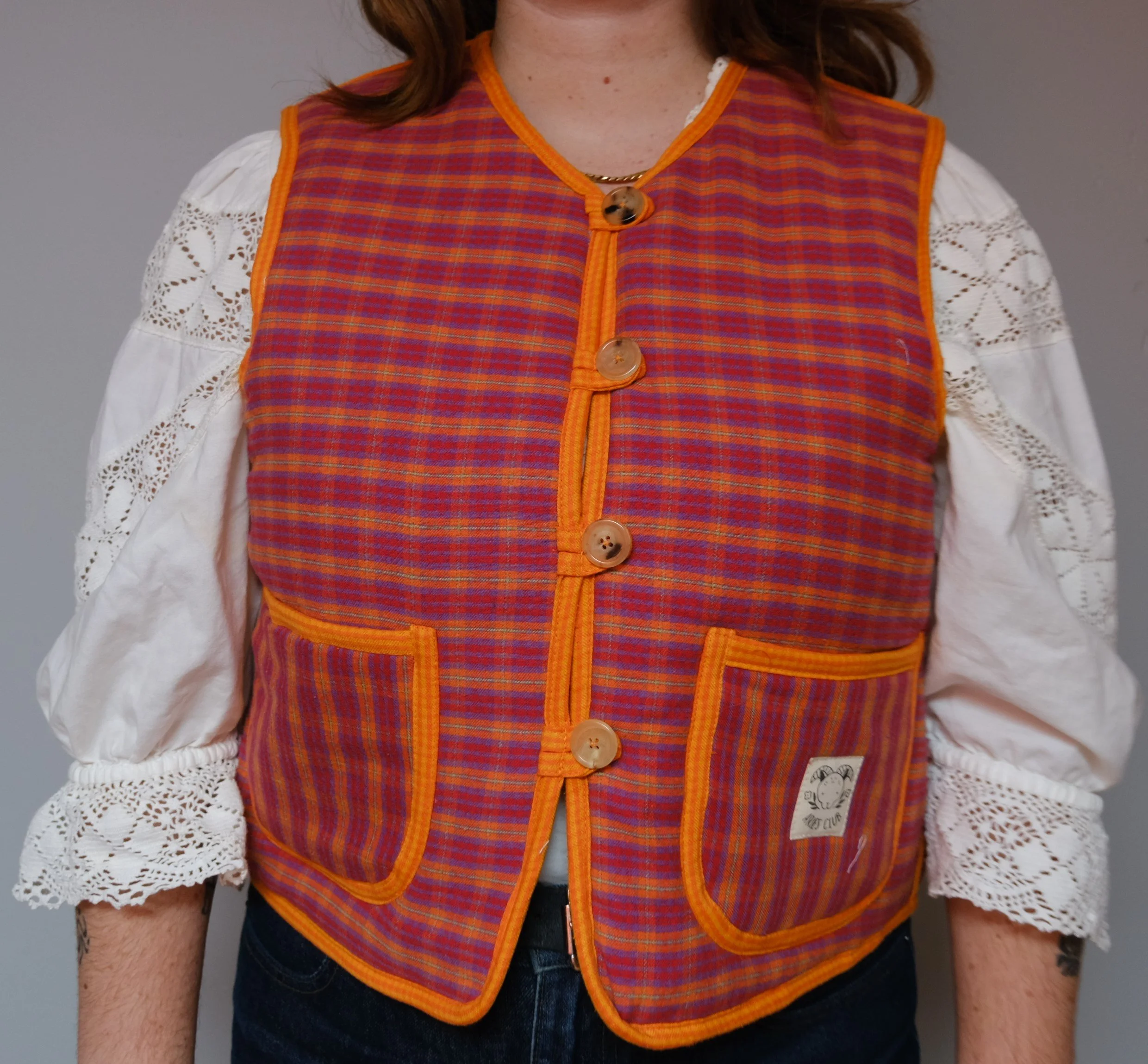 GILET MATELASSÉ CARREAU ORANGE ROUGE VIOLET