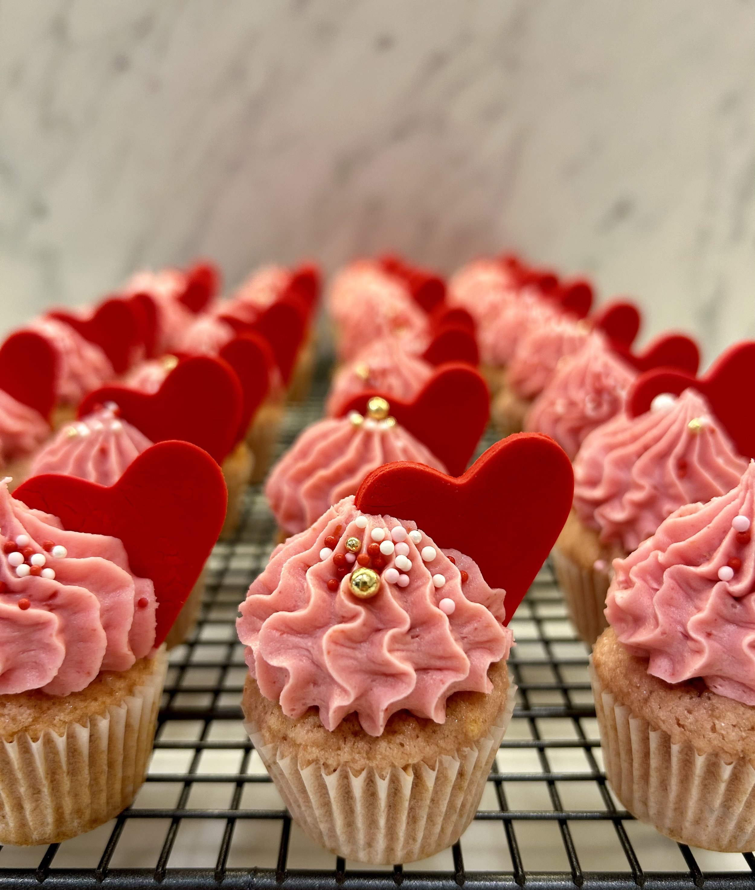 Mini strawberry cupcakes with strawberry buttercream