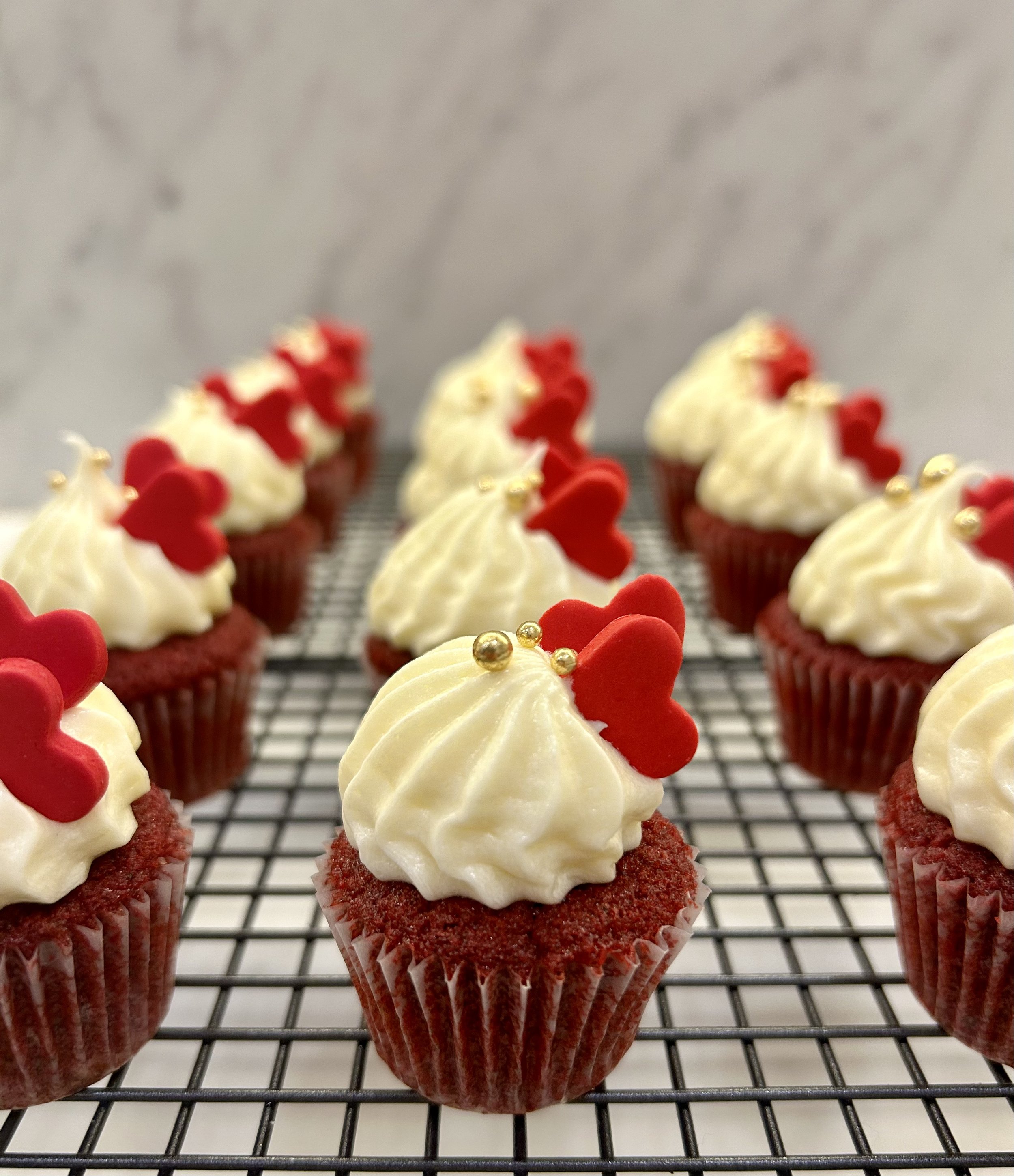 Mini red velvet cupcakes with cream cheese frosting