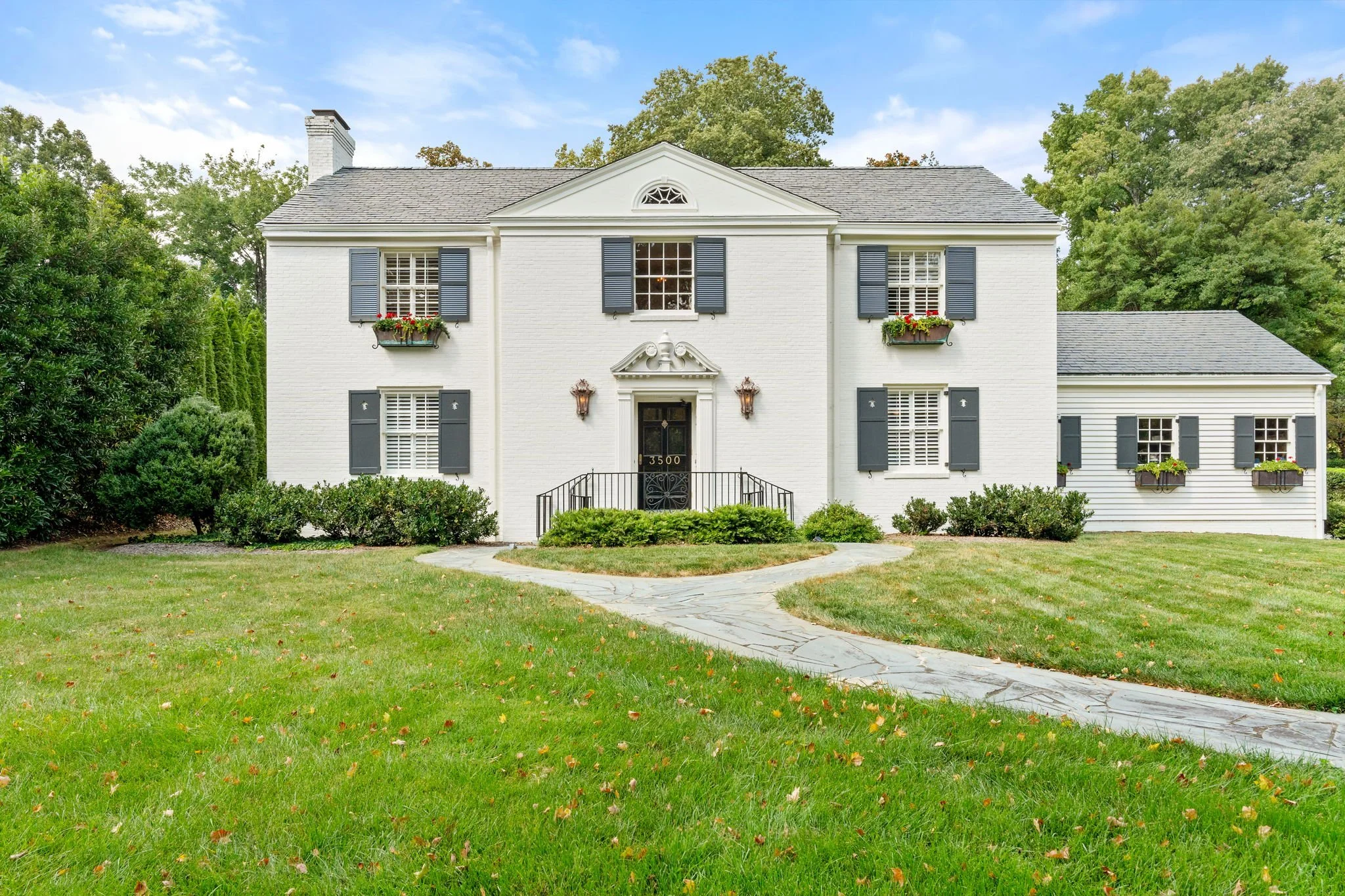 🏠 There&rsquo;s something unforgettable about 3500 Starmount Drive, known around Greensboro as the &ldquo;Flower Box House.&rdquo; This Georgian Revival home in Starmount Forest has that kind of timeless elegance you can feel the moment you walk in.