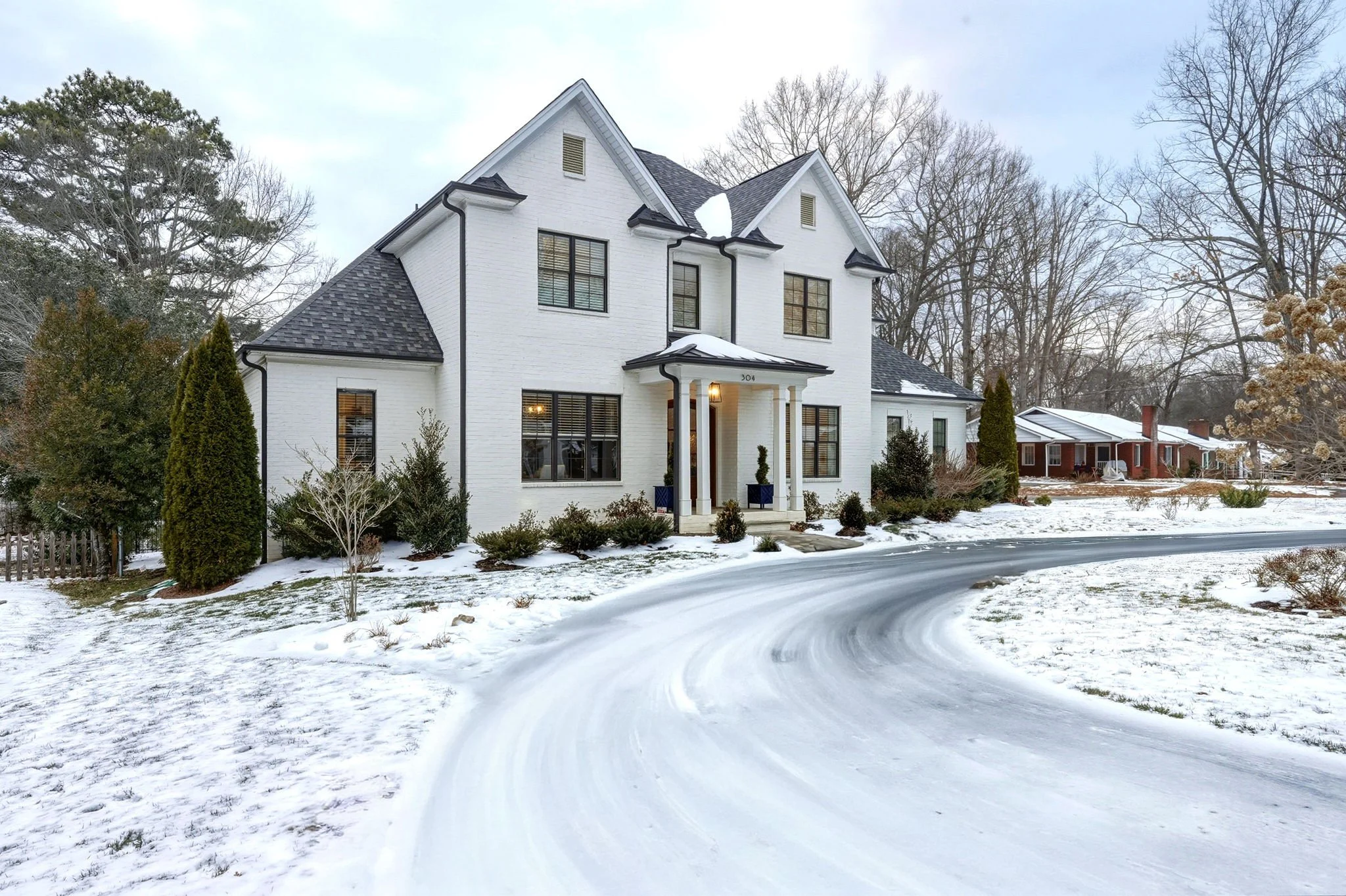 A 2018 Tate Rice custom build defined by intentional design, elevated finishes, and seamless indoor outdoor living just steps from Forsyth Country Club. Winter light makes the details even better. Under contract and a standout example of thoughtful d