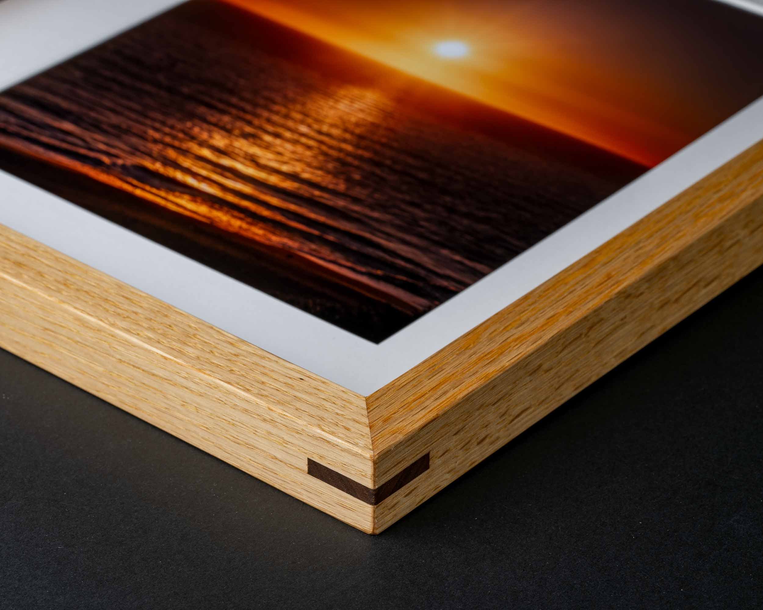Oak picture frame with contrasting Walnut splines highlighting quality craftsmanship