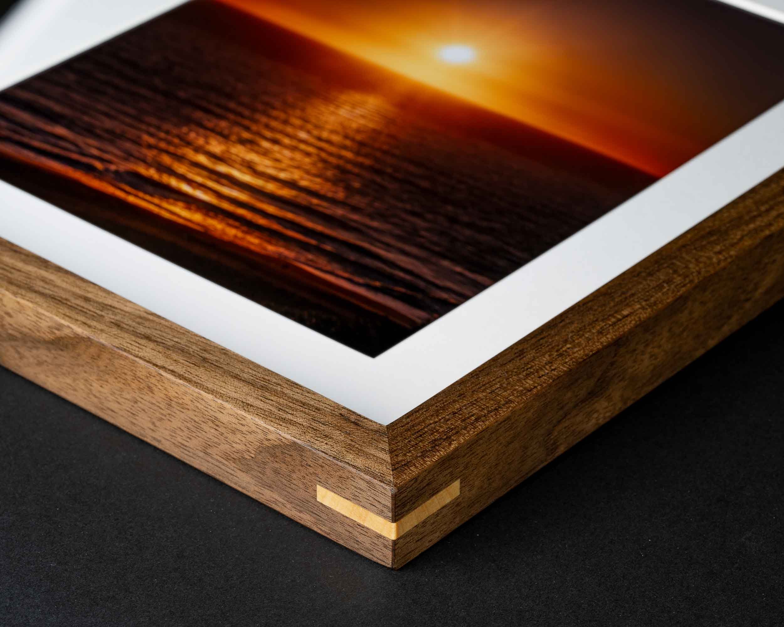 Walnut picture frame with contrasting Maple splines highlighting quality craftsmanship