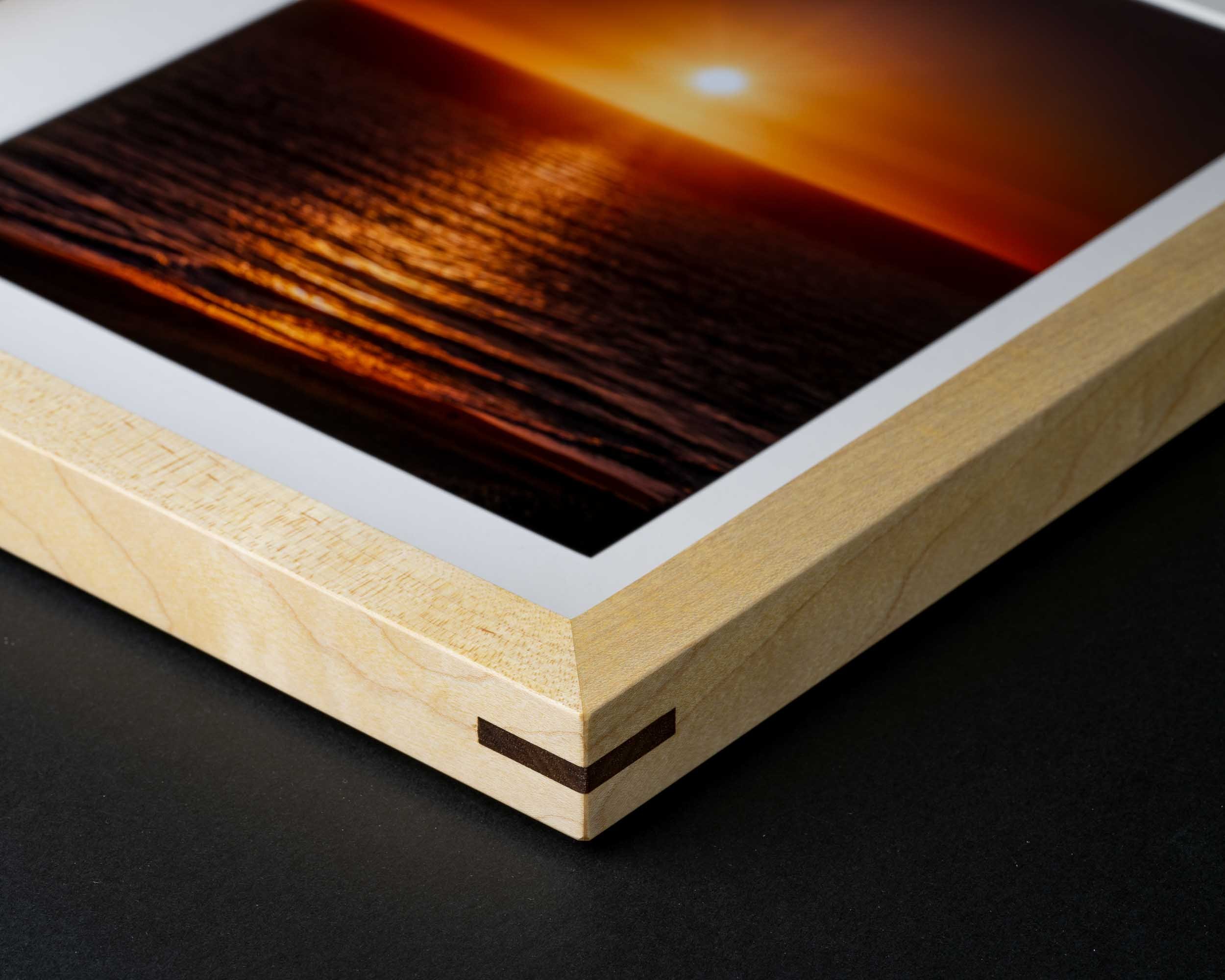 Maple picture frame with contrasting Walnut splines highlighting quality craftsmanship