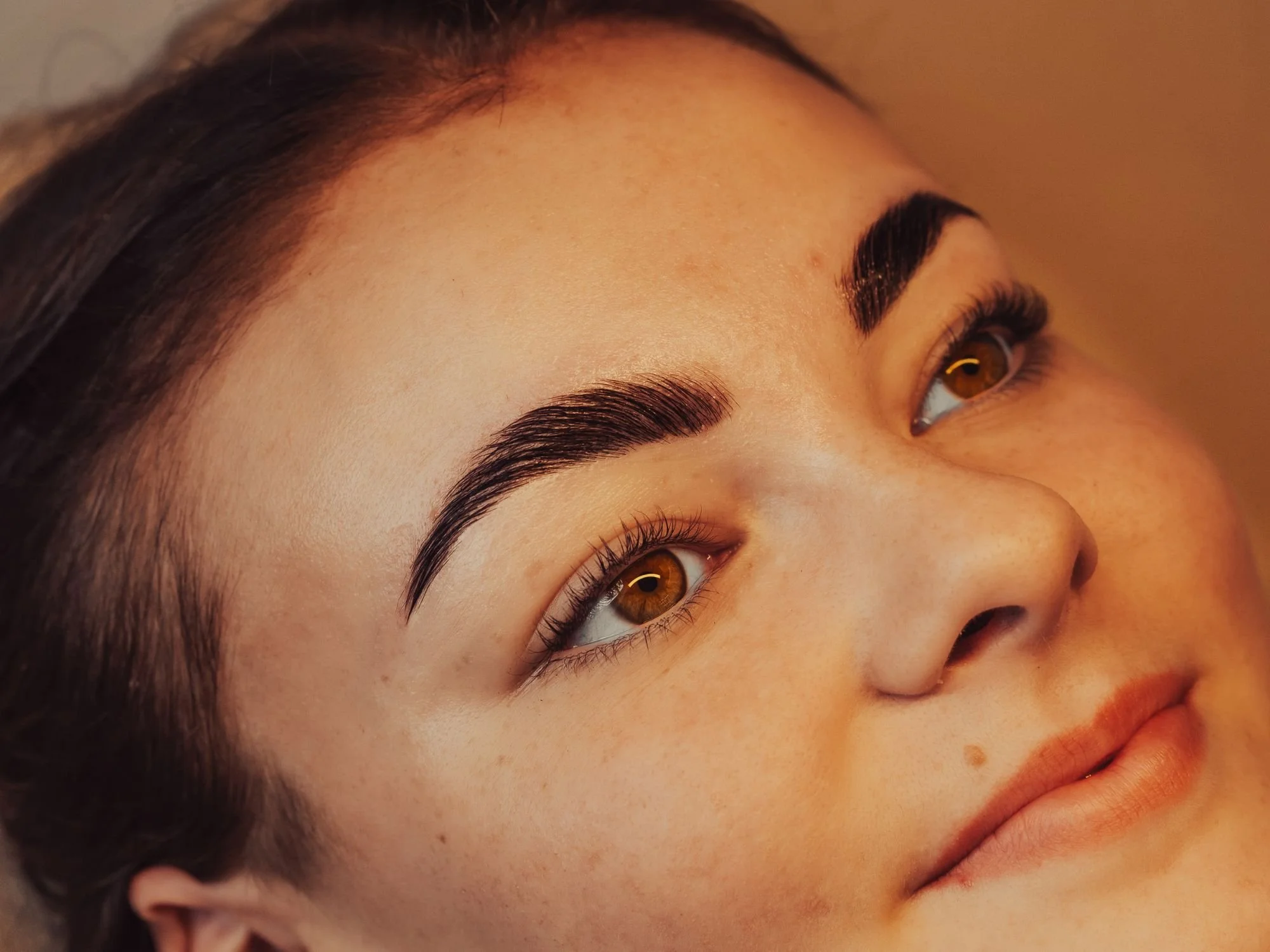 Professional brow and lash treatments at BLINK Beauty studio in Renfrew