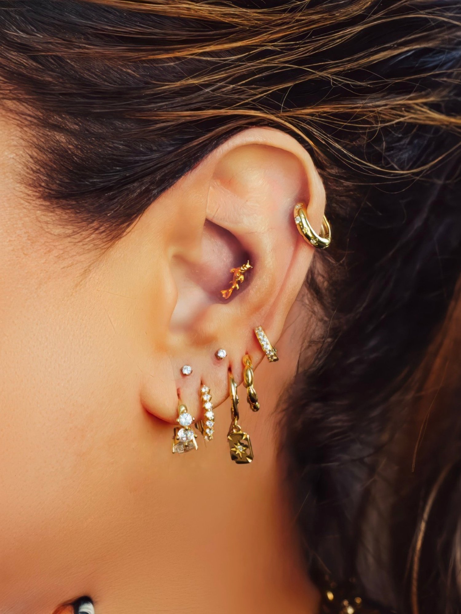 Finished curated ear piercing results at BLINK Beauty in Renfrew