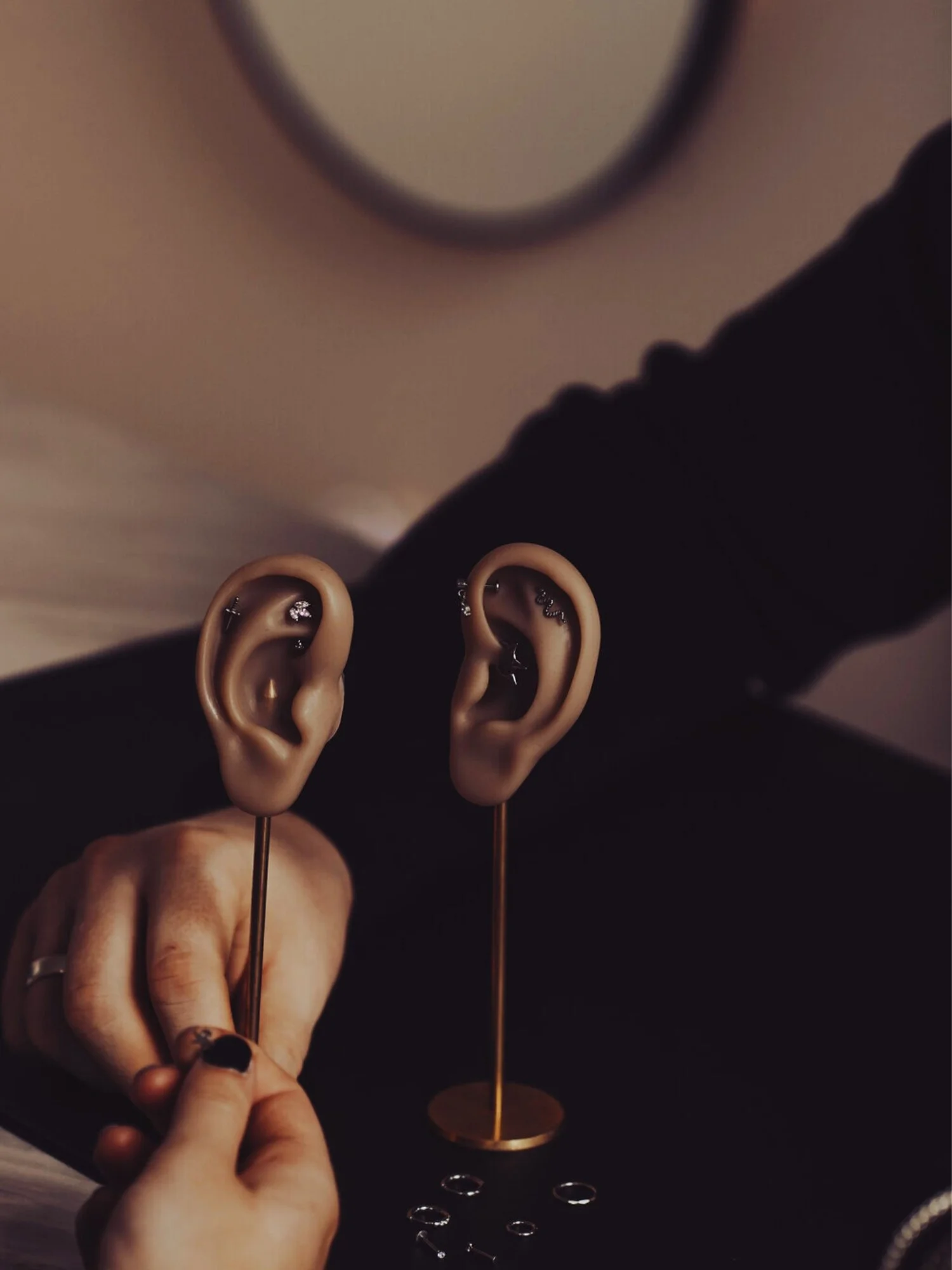 One-to-one piercing consultation and ear curation at BLINK Beauty Renfrew