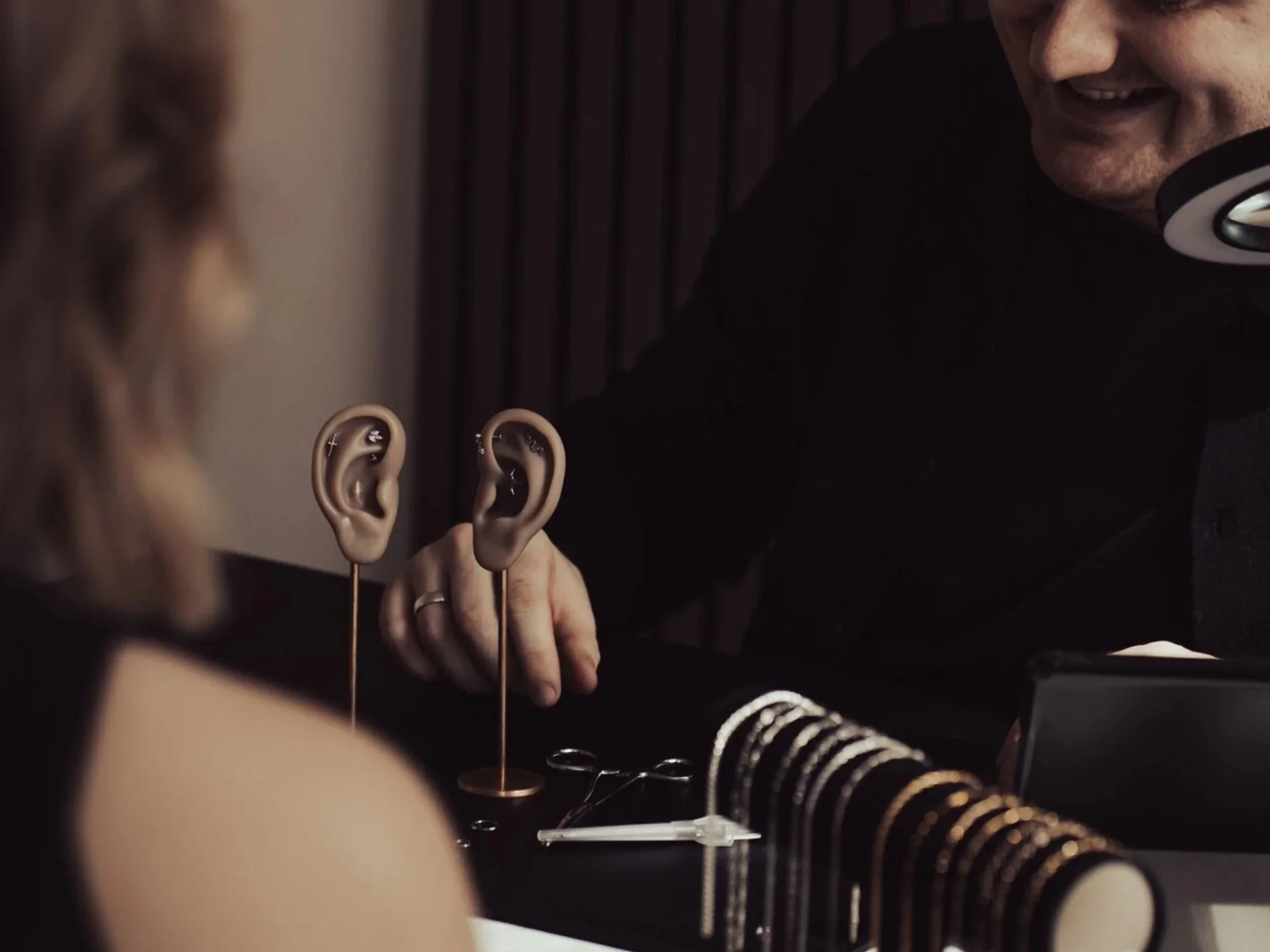 Ear styling consultation with curated jewellery at BLINK Beauty in Renfrew