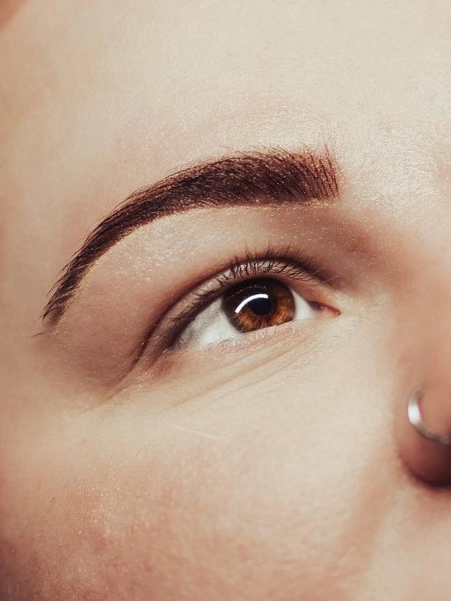 Brow shape refresh treatment at BLINK Beauty studio in Renfrew