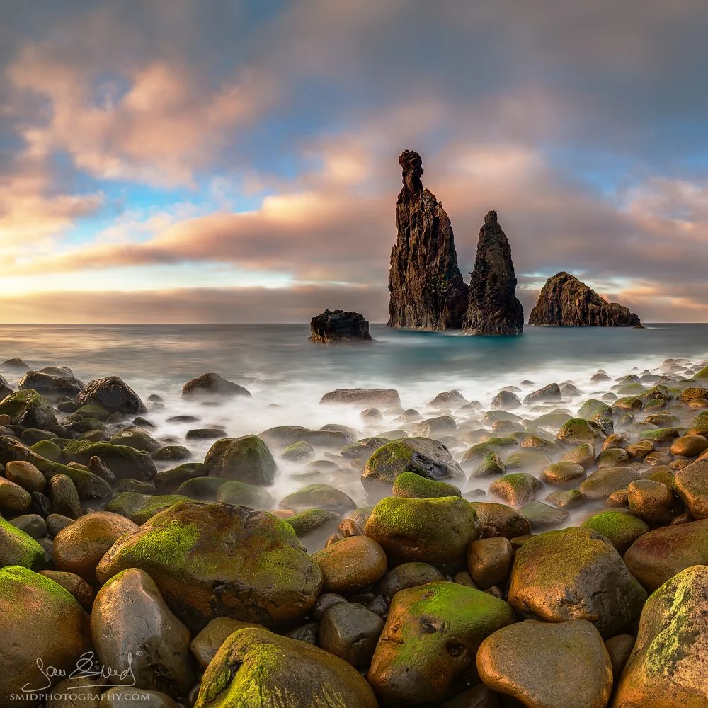 Award-winning panoramic seascape photograph "The Two Fingers II" capturing the iconic volcanic sea stacks of Ribeira da Janela, Madeira, during a spectacular sunrise. Captured by Jan Smid, Master QEP, in 2019.
