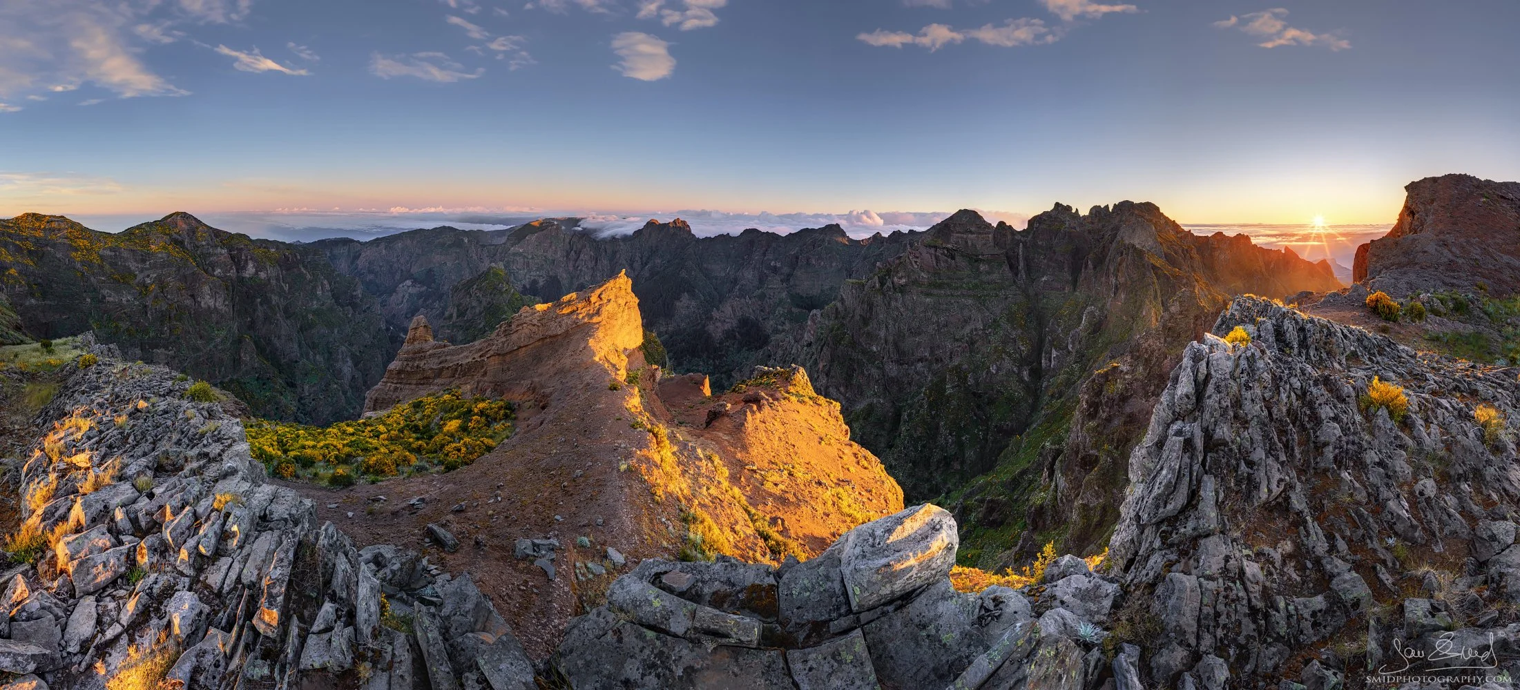 Extra-wide panoramic landscape photograph "From the Highest Crests" featuring the jagged volcanic ridges of Pico do Arieiro, Madeira, at sunrise. Captured from a unique, hidden vantage point by Jan Smid, Master QEP, in 2024.