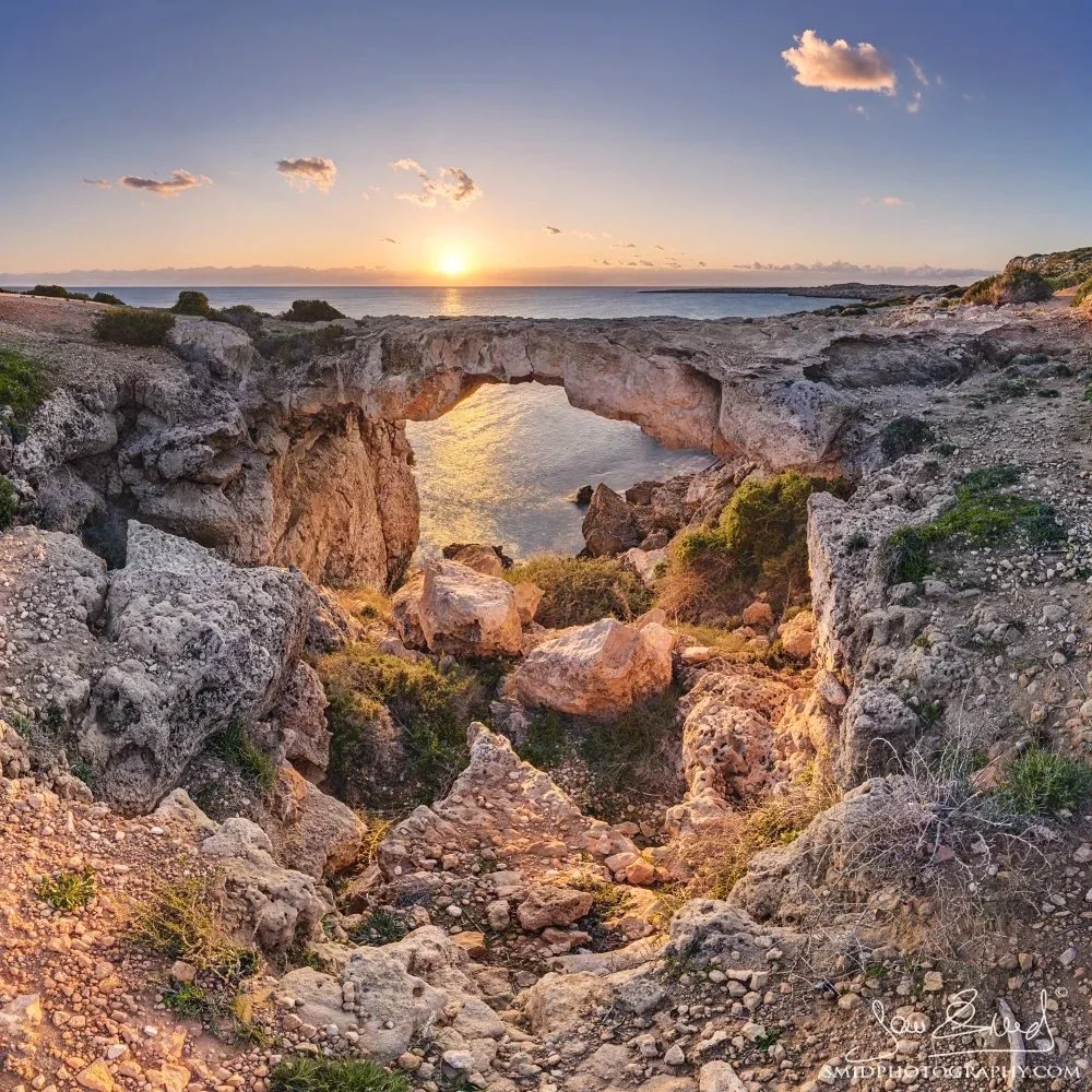 Sunrise over the natural sea arch at Cape Greco near Protaras, Cyprus – dramatic Mediterranean seascape photographed during a Cyprus landscape photography expedition.