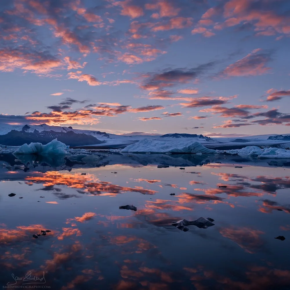 Dramatic landscape panorama titled "Cloud Carnival" at Jökulsárlón glacier lagoon, Iceland. Spectacular cloud formations over drifting icebergs. Captured by Jan Smid, Master QEP, during a 2015 photo expedition. High-end fine art photography.