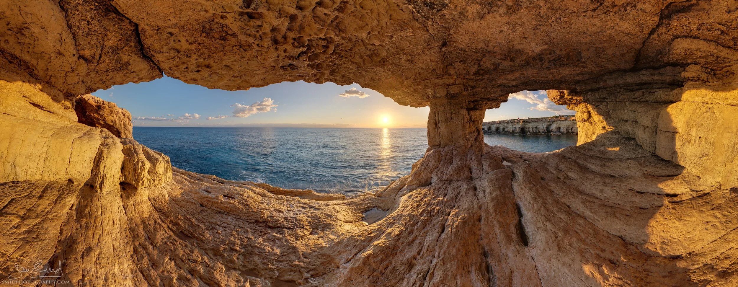 Full 360-degree panoramic sunset over the Mediterranean Sea, viewed from inside the famous sea caves near Ayia Napa, Cyprus. Captured during Jan Smid’s 2026 Cyprus Photo Expedition. Warm evening light illuminating the stone chamber and horizon.