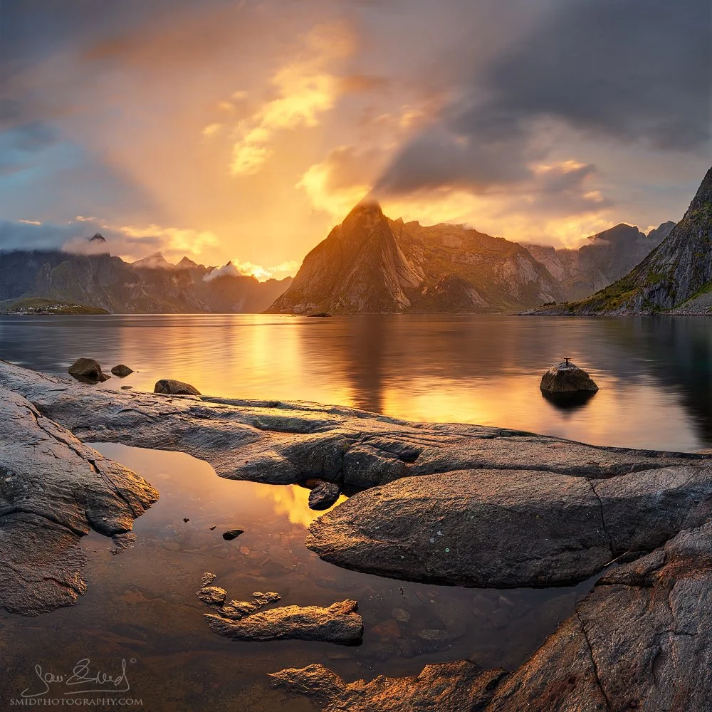 Award-winning panoramic photograph "The Cloud Factory" capturing a pristine, now vanished view of Hamnøy before resort development. Captured by Jan Smid, Master QEP, in 2019.