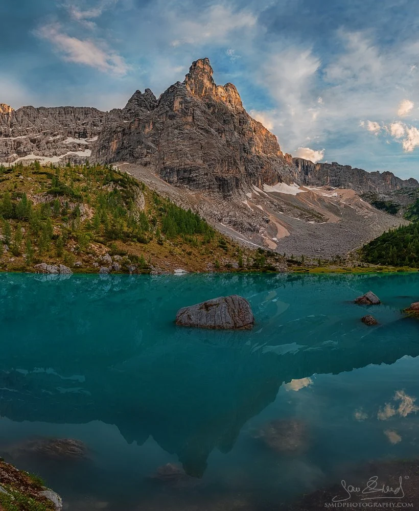 Vertical panorama of the turquoise Lago di Sorapis in the Dolomites during summer, titled Turquoise Waters, by Jan Smid, Master QEP.