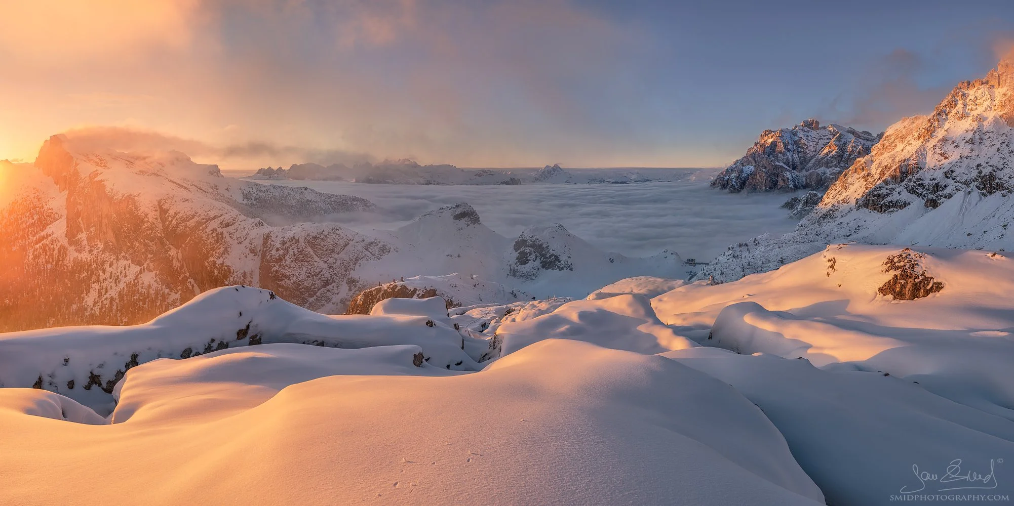 Snowy Dolomites peaks rising above a sea of clouds at sunset by Jan Smid, Master QEP.