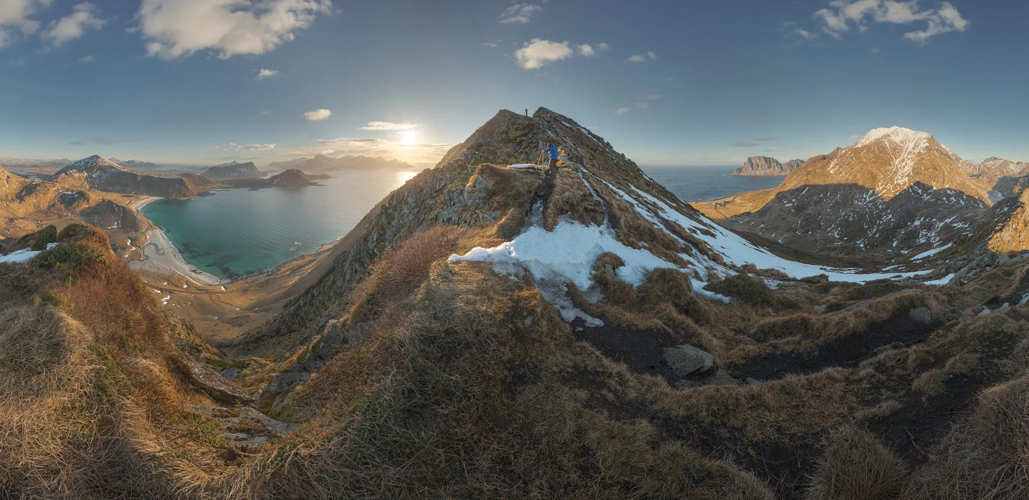 A workshop participant capturing the scale of the Lofoten peaks during a high-end photo expedition with Jan Smid Master QEP.