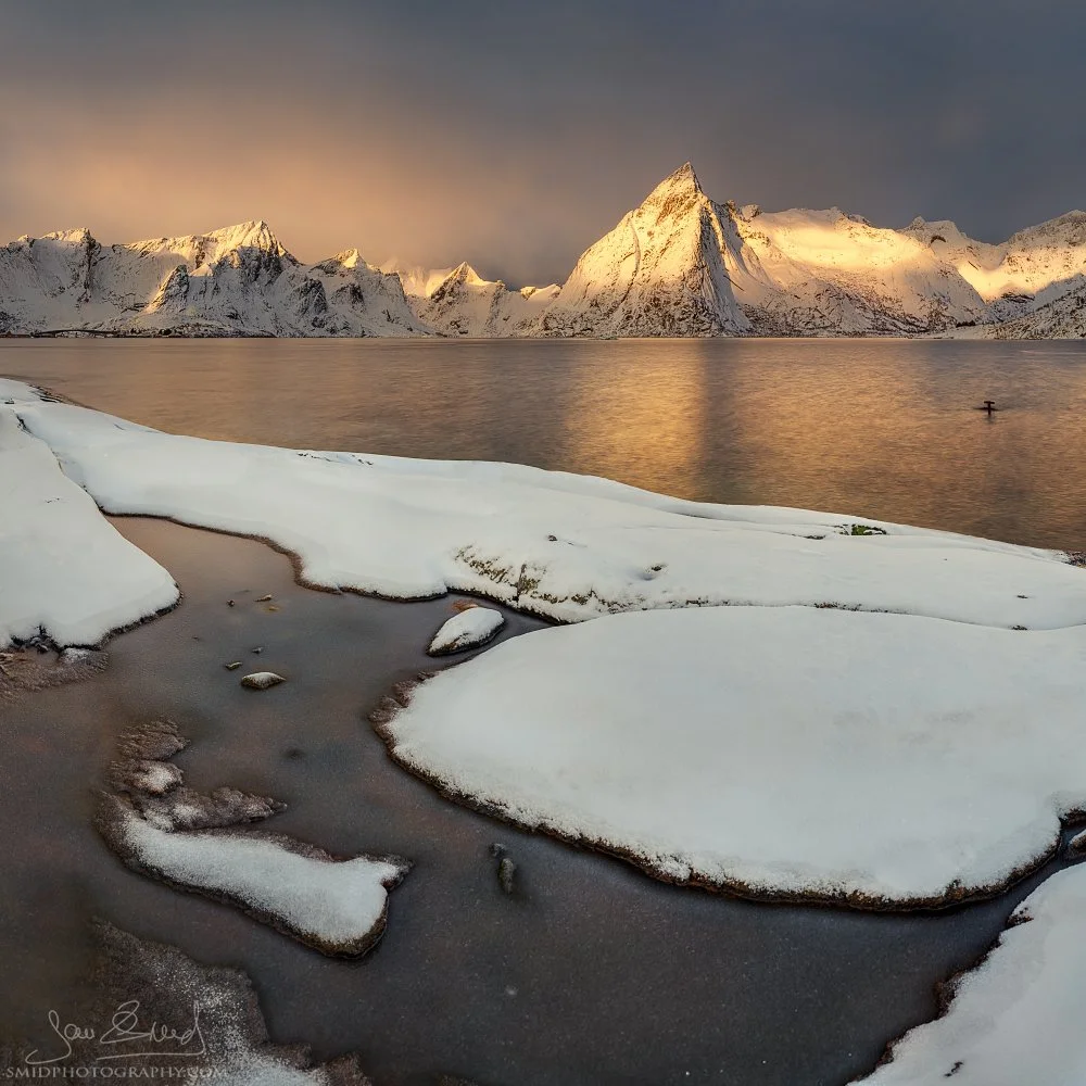Panoramic winter photograph "The Cloud Factory II" capturing the pristine, now-vanished coastline of Hamnøy before resort development. Captured by Jan Smid, Master QEP, in 2020.