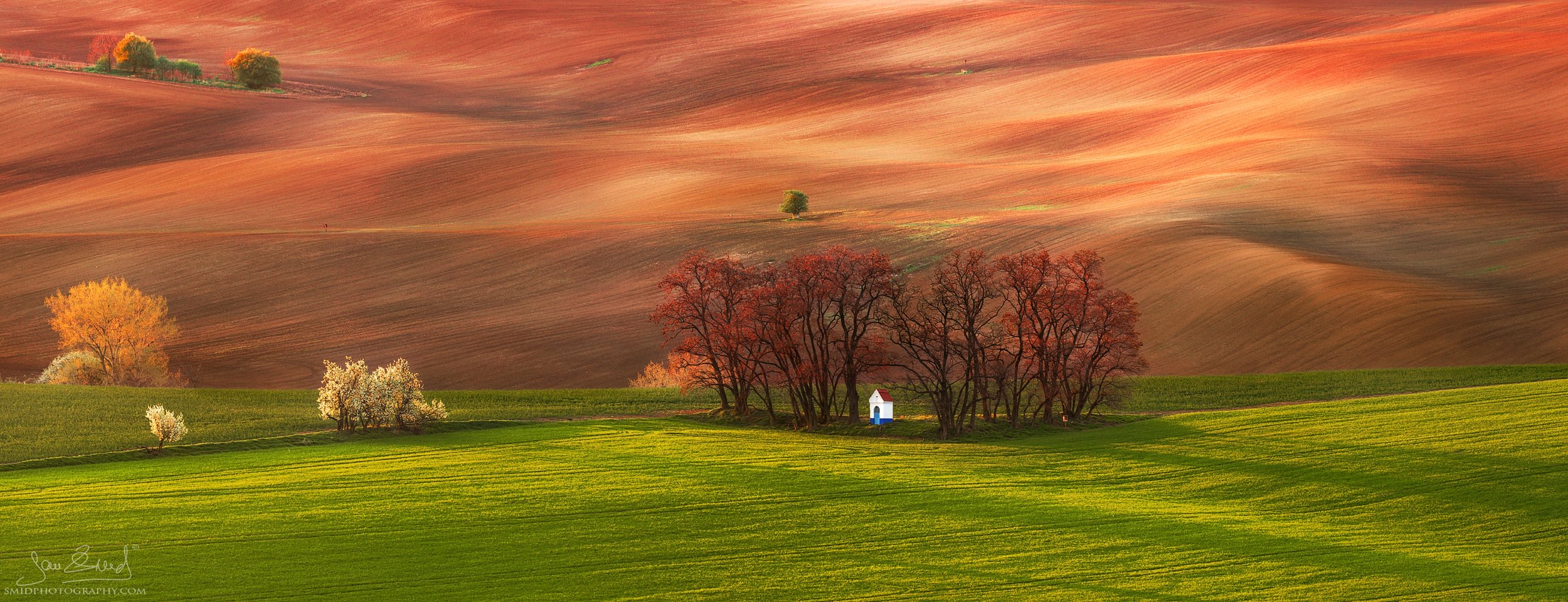 Panoramic spring sunset of the Barborka chapel in South Moravia, titled Oasis, by Jan Smid, Master QEP. Award-winning landscape photography.