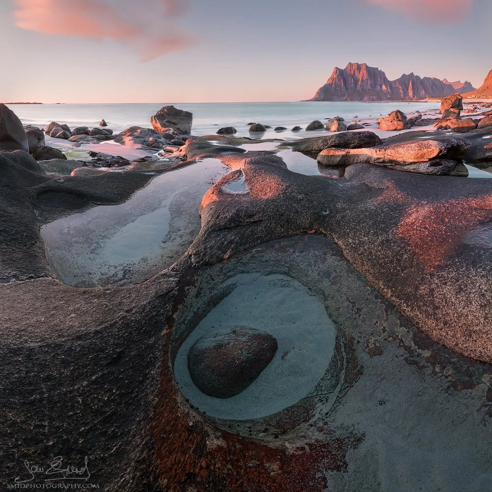Square panoramic photograph "Uttakleiv Eye" capturing the sunset light reflecting in a rock pool at Uttakleiv beach. Professional landscape by Jan Smid, Master QEP, 2017.