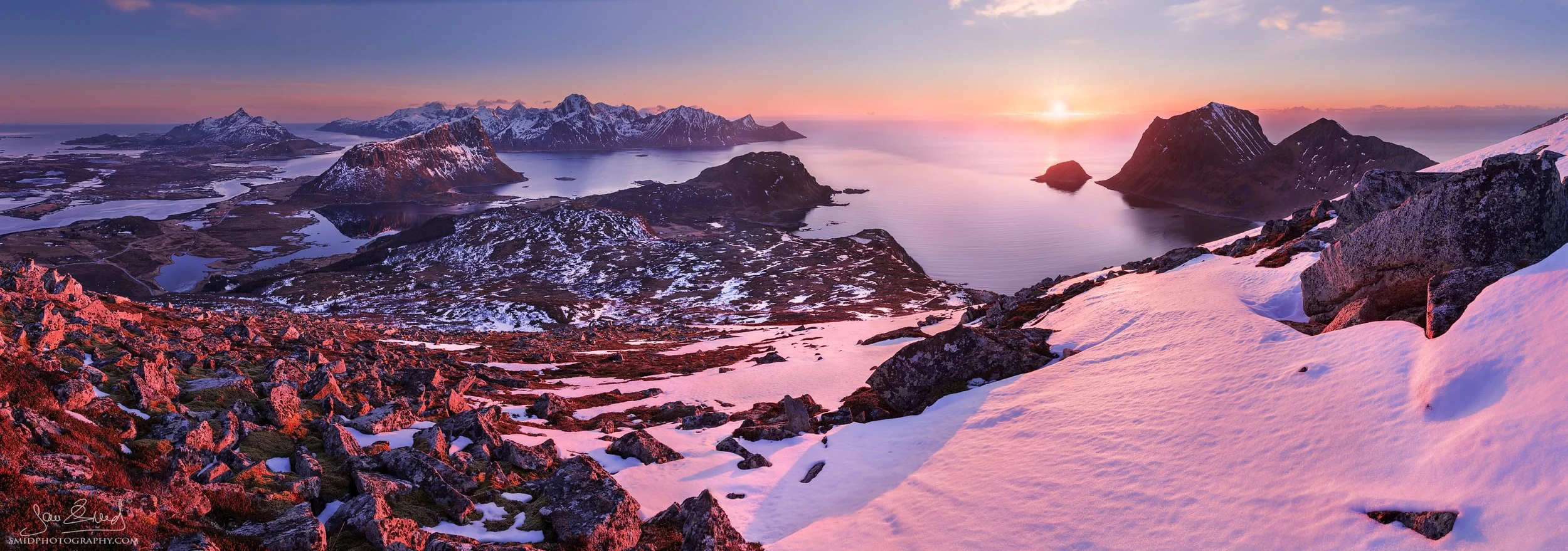 Multi-award-winning panoramic photograph "Beyond the Arctic Circle" capturing a dramatic golden sunset from a secret peak in Lofoten. Professional landscape by Jan Smid, Master QEP, 2016.