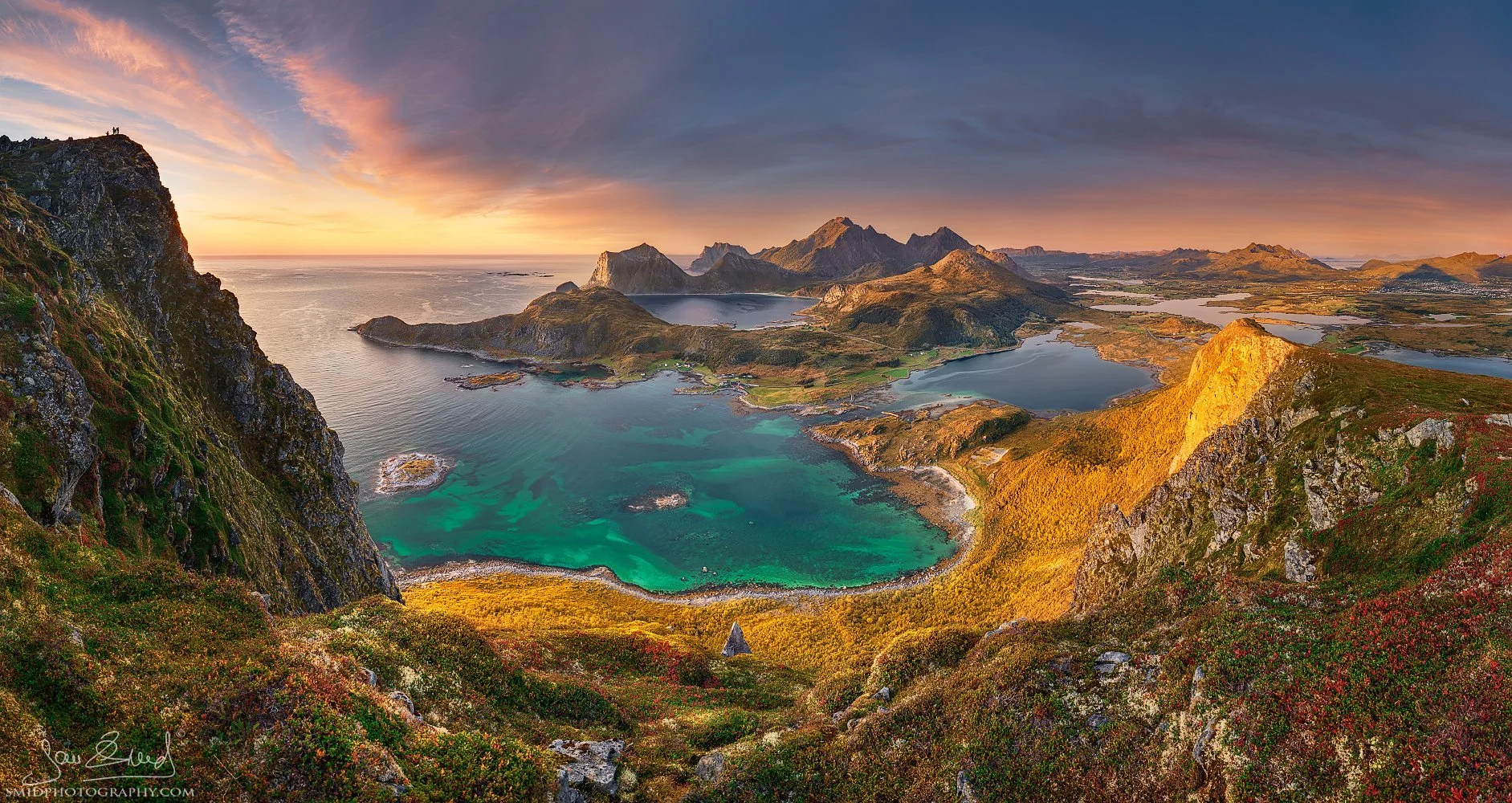Award-winning panoramic photograph "Spectators" featuring majestic mountain peaks resembling silent observers over the Arctic landscape. Captured by Jan Smid, Master QEP, in 2019.