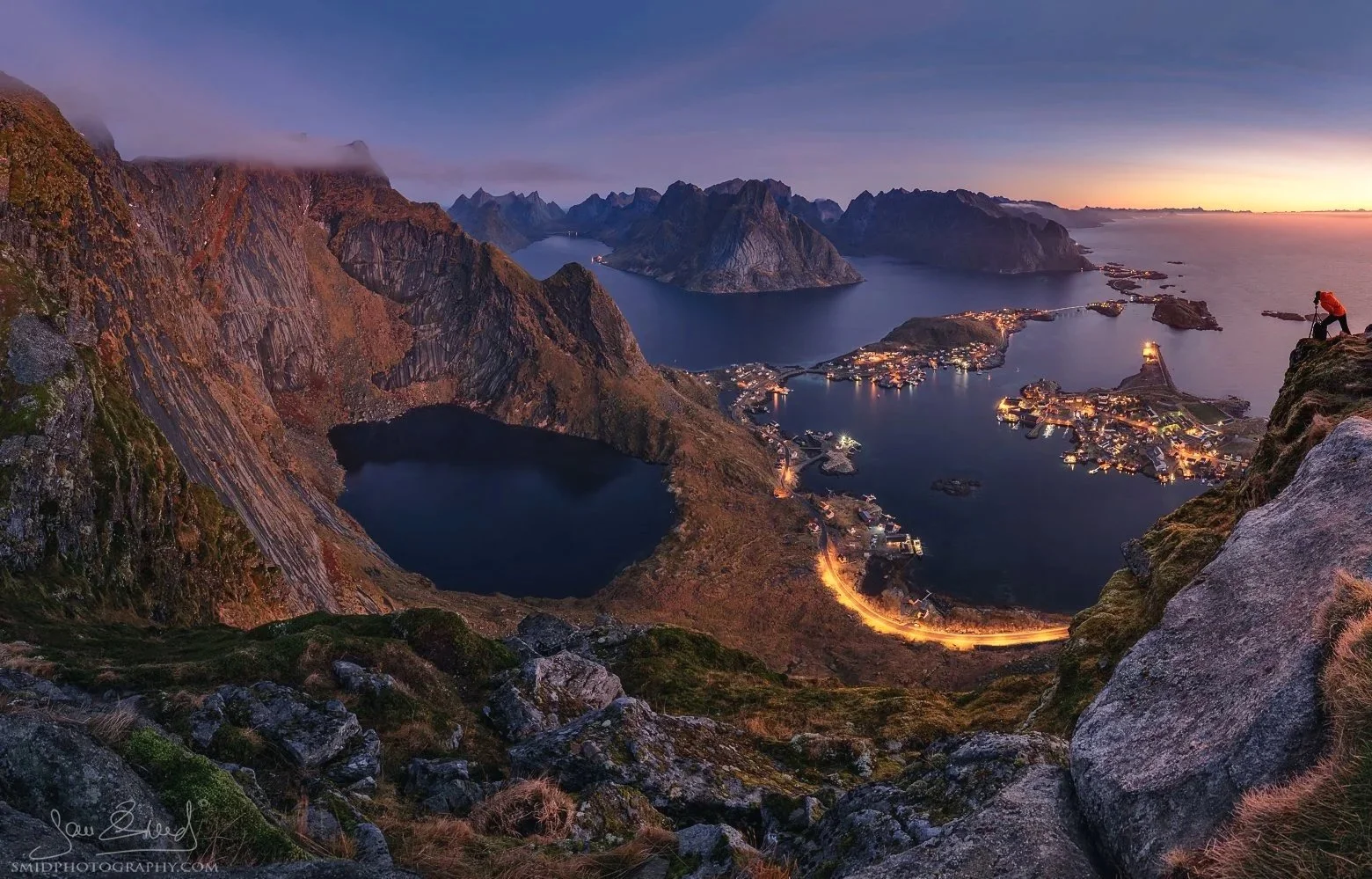 Award-winning panoramic masterpiece from Reinebringen peak, Lofoten, showing the iconic view over Reine fjord and village at sunset, by Jan Smid Master QEP.