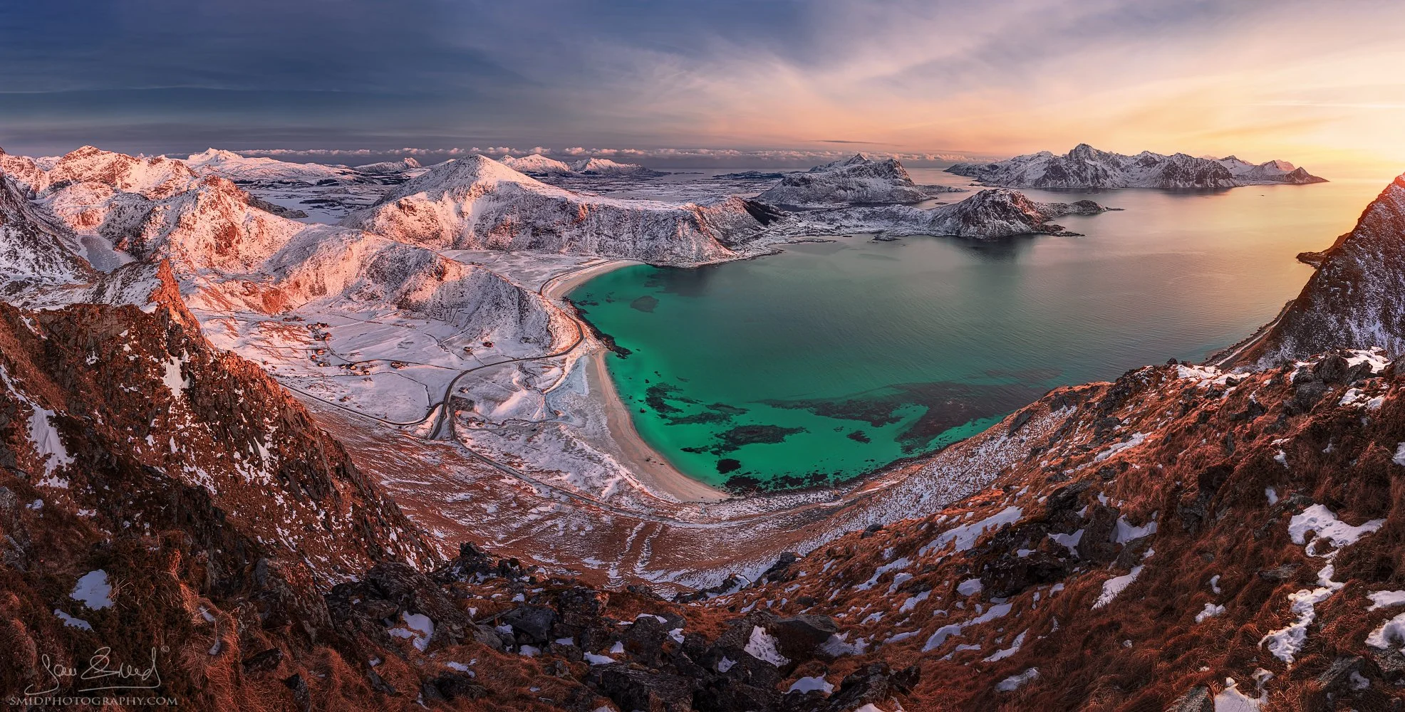 Panoramic landscape photograph "Winter Countdown" showing a dramatic mountain ridge overlooking the ocean in Lofoten. Captured by Jan Smid, Master QEP, in 2018.