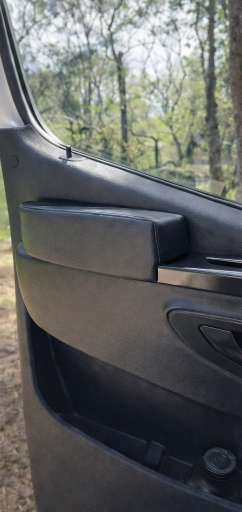 image of a mercedes-benz sprinter interior door panel with MARV armrest installed
