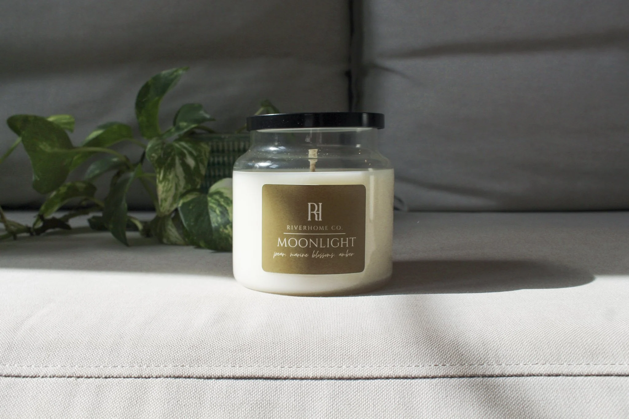 moonlight candle sitting on calm linen