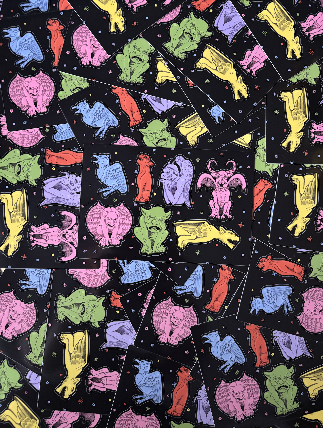 photo of gargoyle sticker sheets spread out in a pile. click this photo to go to product listing.