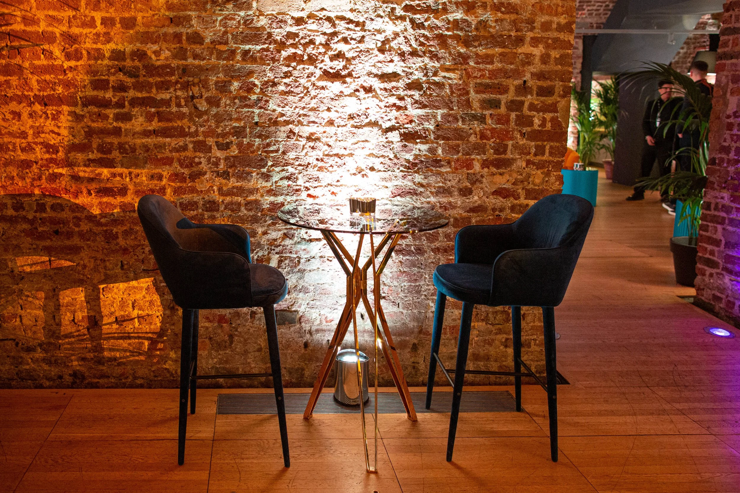 Wedding reception moody lighting and lounge furniture