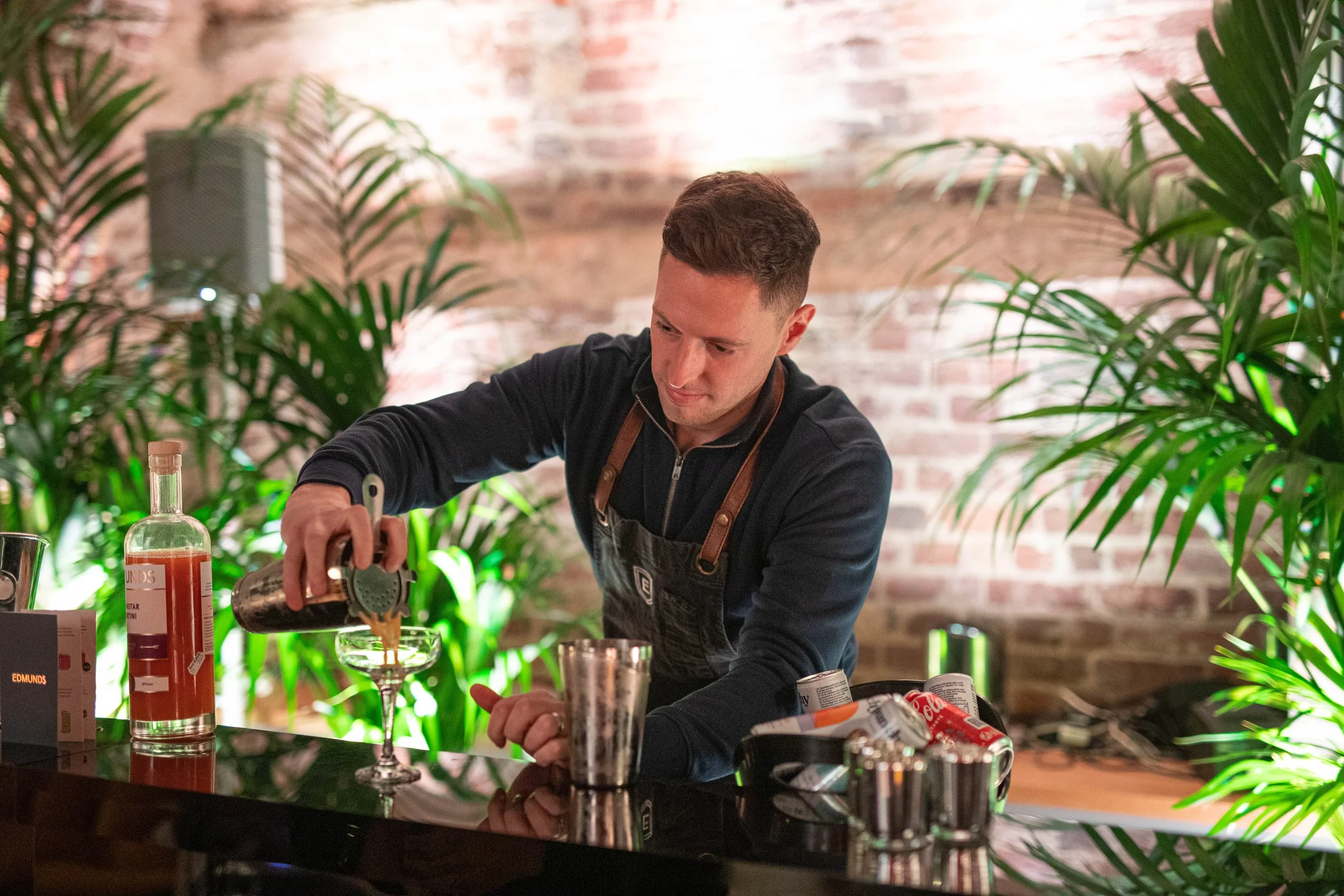 Wedding Bartender with black bar